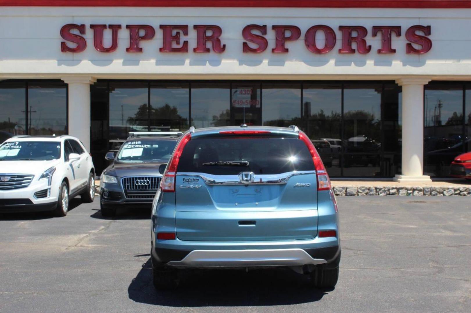 2016 Teal Honda CR-V EX-L AWD (2HKRM4H75GH) with an 2.4L L4 DOHC 16V engine, CVT transmission, located at 4301 NW 39th , Oklahoma City, OK, 73112, (405) 949-5600, 35.512135, -97.598671 - NO DRIVERS LICENCE NO-FULL COVERAGE INSURANCE-NO CREDIT CHECK. COME ON OVER TO SUPERSPORTS AND TAKE A LOOK AND TEST DRIVE. PLEASE GIVE US A CALL AT (405) 949-5600. NO LICENSIA DE MANEJAR- NO SEGURO DE COBERTURA TOTAL- NO VERIFICACCION DE CREDITO. POR FAVOR VENGAN A SUPERSPORTS, ECHE UN - Photo#4