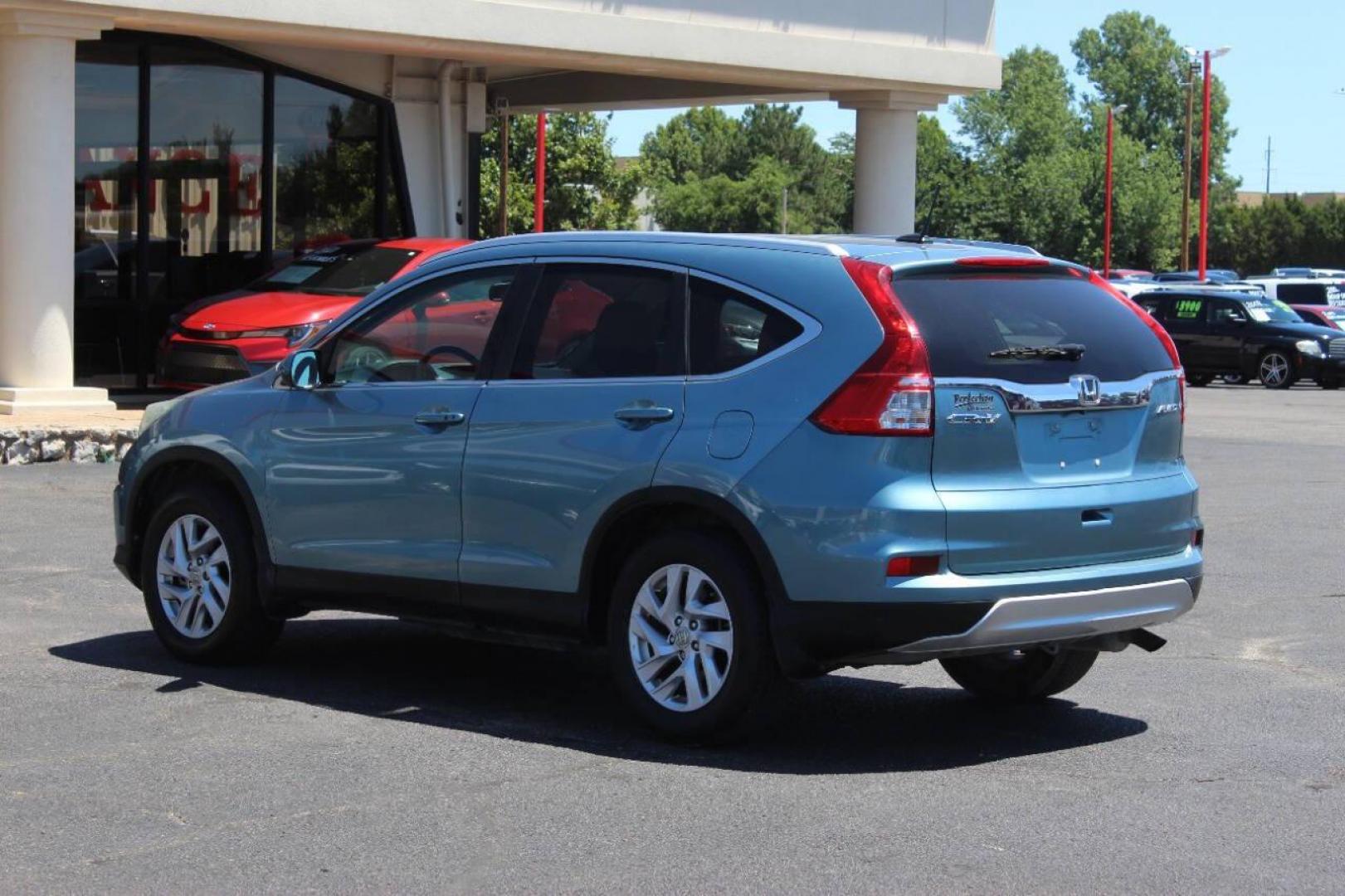 2016 Teal Honda CR-V EX-L AWD (2HKRM4H75GH) with an 2.4L L4 DOHC 16V engine, CVT transmission, located at 4301 NW 39th , Oklahoma City, OK, 73112, (405) 949-5600, 35.512135, -97.598671 - NO DRIVERS LICENCE NO-FULL COVERAGE INSURANCE-NO CREDIT CHECK. COME ON OVER TO SUPERSPORTS AND TAKE A LOOK AND TEST DRIVE. PLEASE GIVE US A CALL AT (405) 949-5600. NO LICENSIA DE MANEJAR- NO SEGURO DE COBERTURA TOTAL- NO VERIFICACCION DE CREDITO. POR FAVOR VENGAN A SUPERSPORTS, ECHE UN - Photo#5