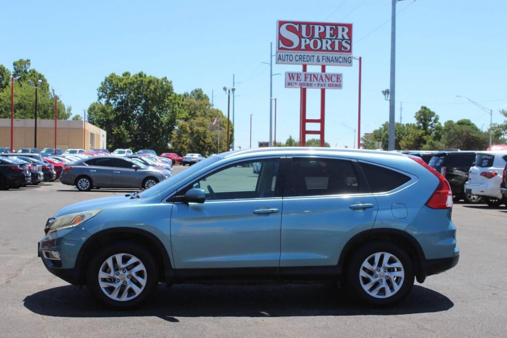 2016 Teal Honda CR-V EX-L AWD (2HKRM4H75GH) with an 2.4L L4 DOHC 16V engine, CVT transmission, located at 4301 NW 39th , Oklahoma City, OK, 73112, (405) 949-5600, 35.512135, -97.598671 - NO DRIVERS LICENCE NO-FULL COVERAGE INSURANCE-NO CREDIT CHECK. COME ON OVER TO SUPERSPORTS AND TAKE A LOOK AND TEST DRIVE. PLEASE GIVE US A CALL AT (405) 949-5600. NO LICENSIA DE MANEJAR- NO SEGURO DE COBERTURA TOTAL- NO VERIFICACCION DE CREDITO. POR FAVOR VENGAN A SUPERSPORTS, ECHE UN - Photo#6