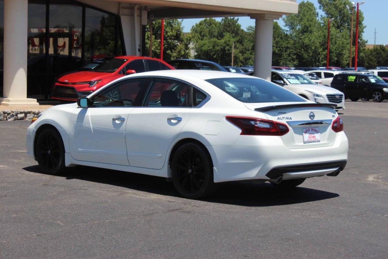 2017 White Nissan Altima 2.5 S (1N4AL3AP5HN) with an 2.5L L4 DOHC 16V engine, CVT transmission, located at 4301 NW 39th , Oklahoma City, OK, 73112, (405) 949-5600, 35.512135, -97.598671 - NO DRIVERS LICENCE NO-FULL COVERAGE INSURANCE-NO CREDIT CHECK. COME ON OVER TO SUPERSPORTS AND TAKE A LOOK AND TEST DRIVE. PLEASE GIVE US A CALL AT (405) 949-5600. NO LICENSIA DE MANEJAR- NO SEGURO DE COBERTURA TOTAL- NO VERIFICACCION DE CREDITO. POR FAVOR VENGAN A SUPERSPORTS, ECHE UN - Photo#5