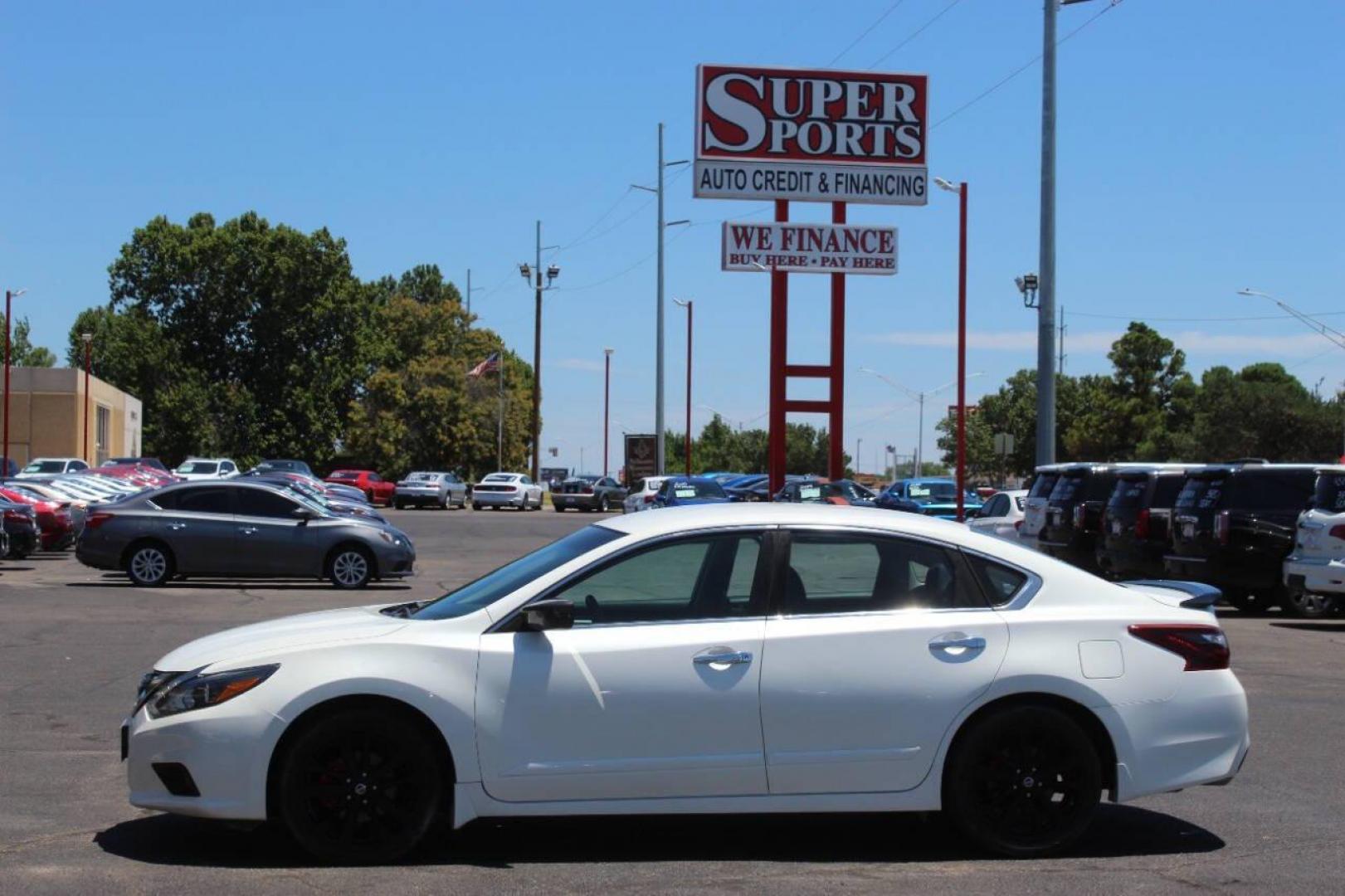 2017 White Nissan Altima 2.5 S (1N4AL3AP5HN) with an 2.5L L4 DOHC 16V engine, CVT transmission, located at 4301 NW 39th , Oklahoma City, OK, 73112, (405) 949-5600, 35.512135, -97.598671 - NO DRIVERS LICENCE NO-FULL COVERAGE INSURANCE-NO CREDIT CHECK. COME ON OVER TO SUPERSPORTS AND TAKE A LOOK AND TEST DRIVE. PLEASE GIVE US A CALL AT (405) 949-5600. NO LICENSIA DE MANEJAR- NO SEGURO DE COBERTURA TOTAL- NO VERIFICACCION DE CREDITO. POR FAVOR VENGAN A SUPERSPORTS, ECHE UN - Photo#6