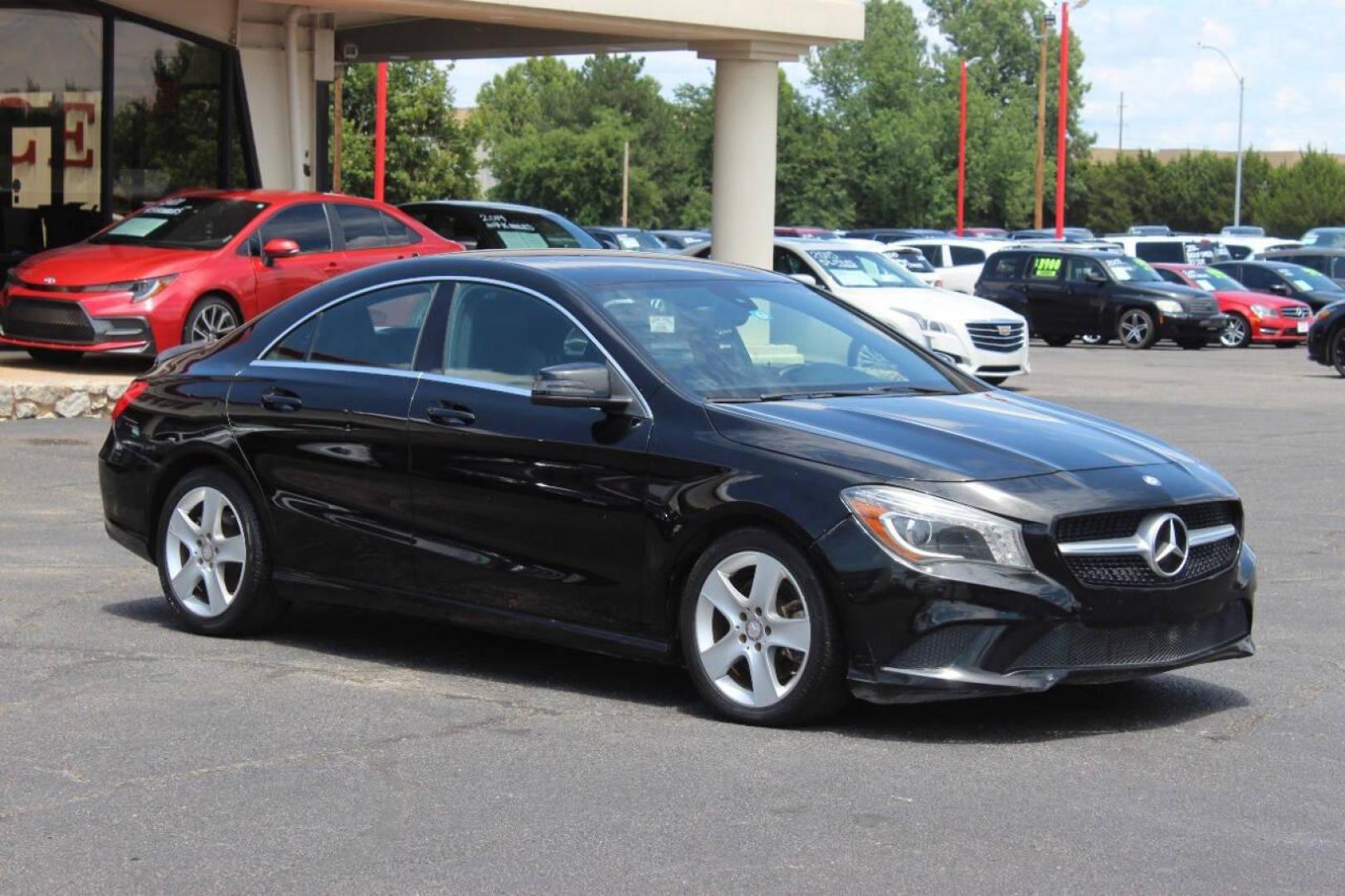 2015 Black Mercedes-Benz CLA-Class CLA250 (WDDSJ4EB6FN) with an 2.0L L4 DOHC 16V engine, 7-Speed Automatic transmission, located at 4301 NW 39th , Oklahoma City, OK, 73112, (405) 949-5600, 35.512135, -97.598671 - NO DRIVERS LICENCE NO-FULL COVERAGE INSURANCE-NO CREDIT CHECK. COME ON OVER TO SUPERSPORTS AND TAKE A LOOK AND TEST DRIVE. PLEASE GIVE US A CALL AT (405) 949-5600. NO LICENSIA DE MANEJAR- NO SEGURO DE COBERTURA TOTAL- NO VERIFICACCION DE CREDITO. POR FAVOR VENGAN A SUPERSPORTS, ECHE UN - Photo#0