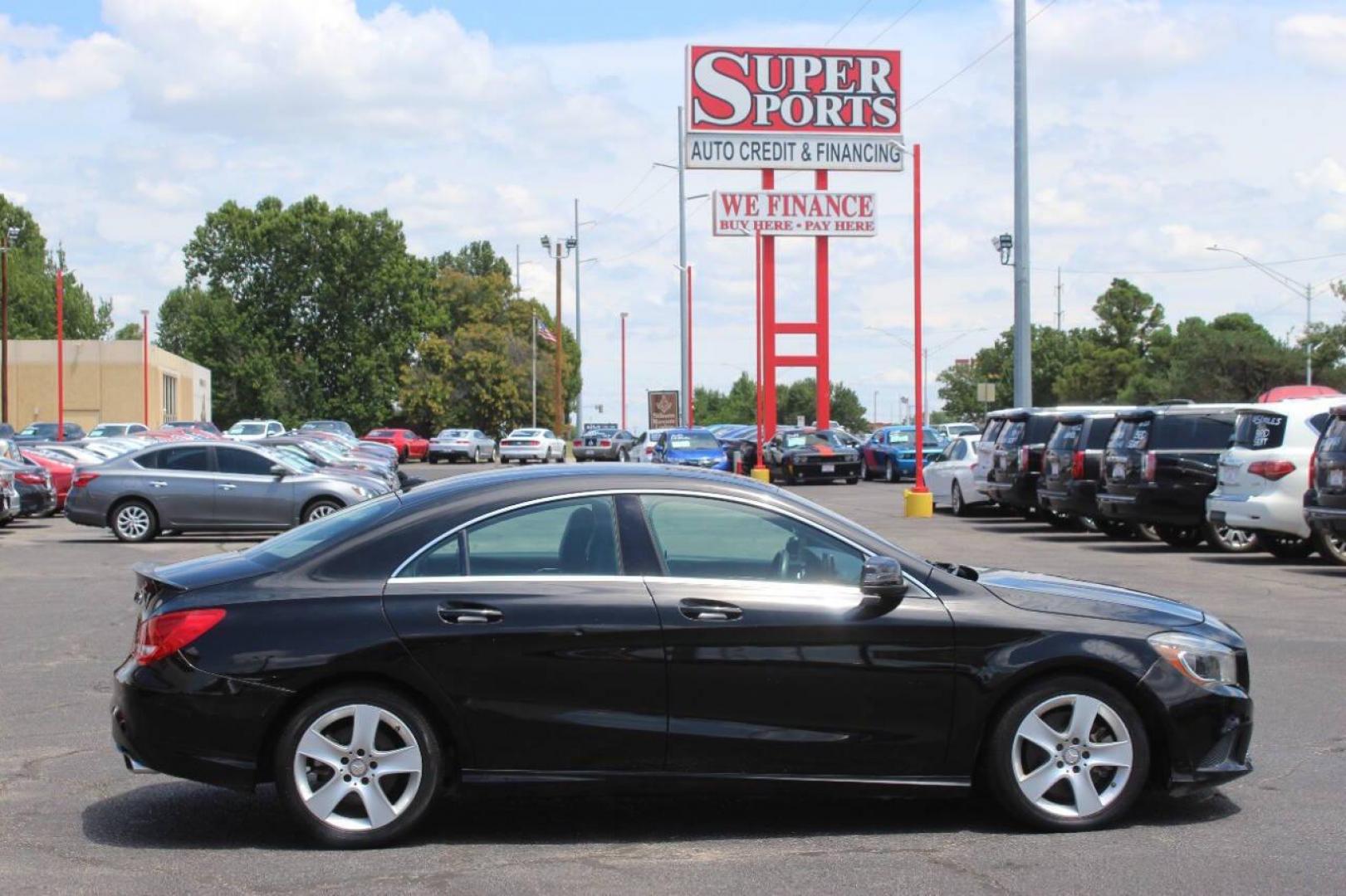 2015 Black Mercedes-Benz CLA-Class CLA250 (WDDSJ4EB6FN) with an 2.0L L4 DOHC 16V engine, 7-Speed Automatic transmission, located at 4301 NW 39th , Oklahoma City, OK, 73112, (405) 949-5600, 35.512135, -97.598671 - NO DRIVERS LICENCE NO-FULL COVERAGE INSURANCE-NO CREDIT CHECK. COME ON OVER TO SUPERSPORTS AND TAKE A LOOK AND TEST DRIVE. PLEASE GIVE US A CALL AT (405) 949-5600. NO LICENSIA DE MANEJAR- NO SEGURO DE COBERTURA TOTAL- NO VERIFICACCION DE CREDITO. POR FAVOR VENGAN A SUPERSPORTS, ECHE UN - Photo#3