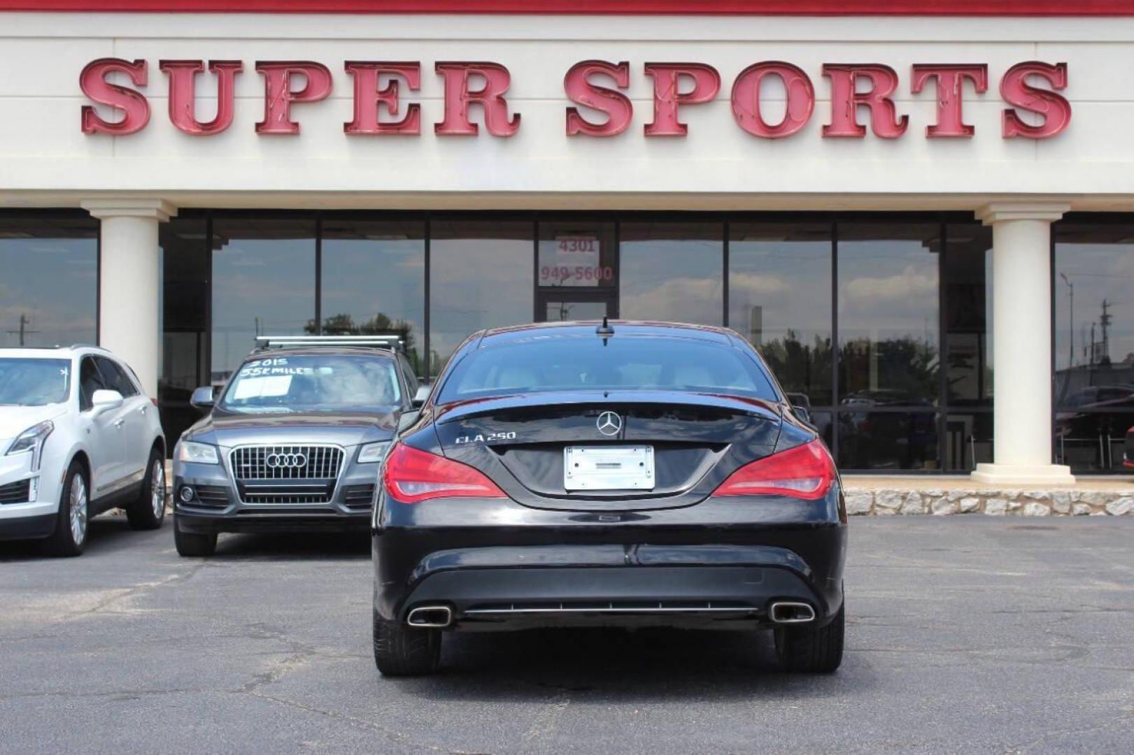 2015 Black Mercedes-Benz CLA-Class CLA250 (WDDSJ4EB6FN) with an 2.0L L4 DOHC 16V engine, 7-Speed Automatic transmission, located at 4301 NW 39th , Oklahoma City, OK, 73112, (405) 949-5600, 35.512135, -97.598671 - NO DRIVERS LICENCE NO-FULL COVERAGE INSURANCE-NO CREDIT CHECK. COME ON OVER TO SUPERSPORTS AND TAKE A LOOK AND TEST DRIVE. PLEASE GIVE US A CALL AT (405) 949-5600. NO LICENSIA DE MANEJAR- NO SEGURO DE COBERTURA TOTAL- NO VERIFICACCION DE CREDITO. POR FAVOR VENGAN A SUPERSPORTS, ECHE UN - Photo#4