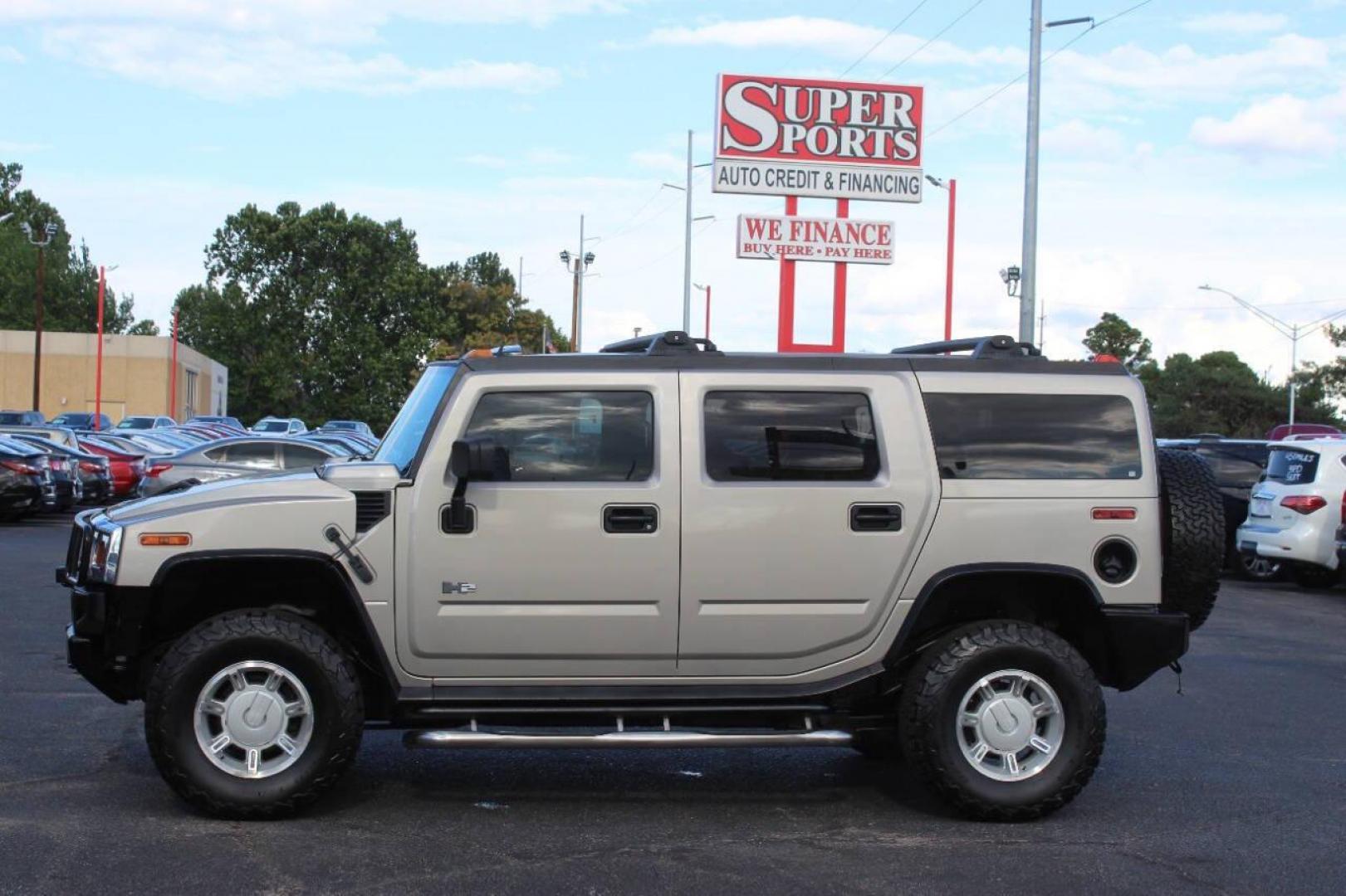 2005 Gold Hummer H2 SUV (5GRGN23U45H) with an 6.0L V8 OHV 16V engine, 4-Speed Automatic Overdrive transmission, located at 4301 NW 39th , Oklahoma City, OK, 73112, (405) 949-5600, 35.512135, -97.598671 - NO DRIVERS LICENCE NO-FULL COVERAGE INSURANCE-NO CREDIT CHECK. COME ON OVER TO SUPERSPORTS AND TAKE A LOOK AND TEST DRIVE PLEASE GIVE US A CALL AT (405) 949-5600. NO LICENSIA DE MANEJAR- NO SEGURO DE COBERTURA TOTAL- NO VERIFICACCION DE CREDITO. POR FAVOR VENGAN A SUPERSPORTS, ECHE UN V - Photo#6