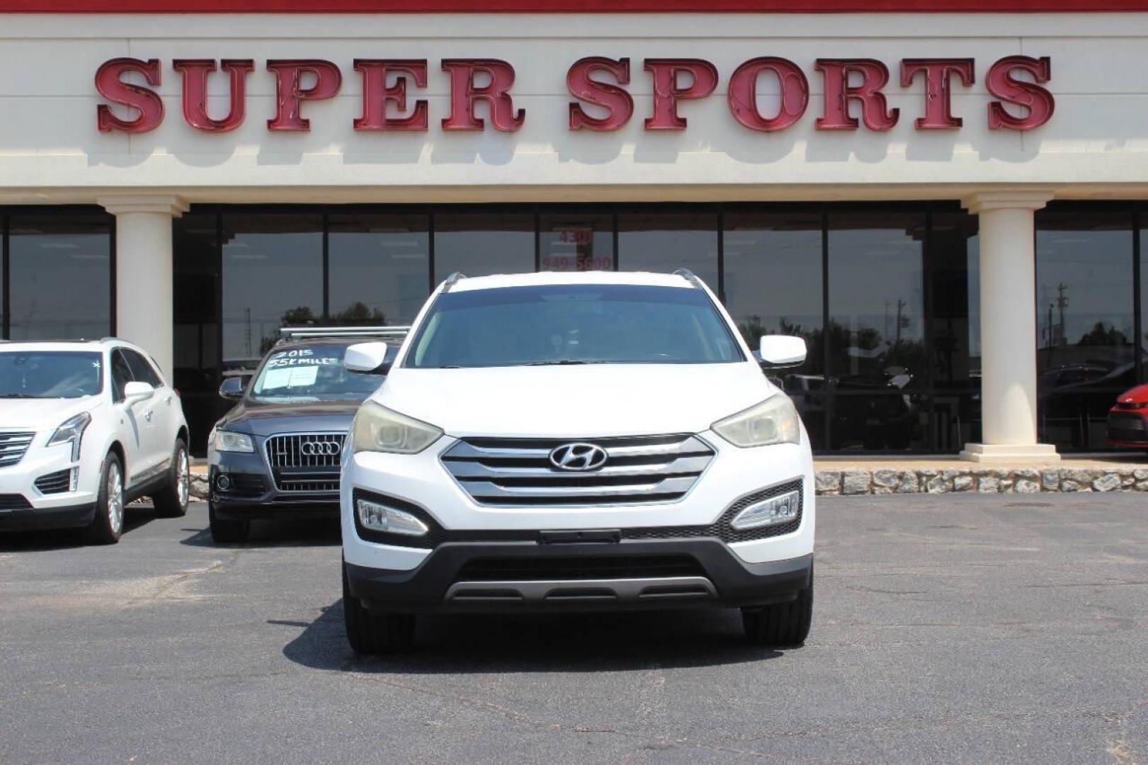 2013 White Hyundai Santa Fe Sport 2.0 FWD (5XYZU3LA8DG) with an 2.0L L4 DOHC 16V engine, 6-Speed Automatic transmission, located at 4301 NW 39th , Oklahoma City, OK, 73112, (405) 949-5600, 35.512135, -97.598671 - NO DRIVERS LICENCE NO-FULL COVERAGE INSURANCE-NO CREDIT CHECK. COME ON OVER TO SUPERSPORTS AND TAKE A LOOK AND TEST DRIVE PLEASE GIVE US A CALL AT (405) 949-5600. NO LICENSIA DE MANEJAR- NO SEGURO DE COBERTURA TOTAL- NO VERIFICACCION DE CREDITO. POR FAVOR VENGAN A SUPERSPORTS, ECHE UN V - Photo#2