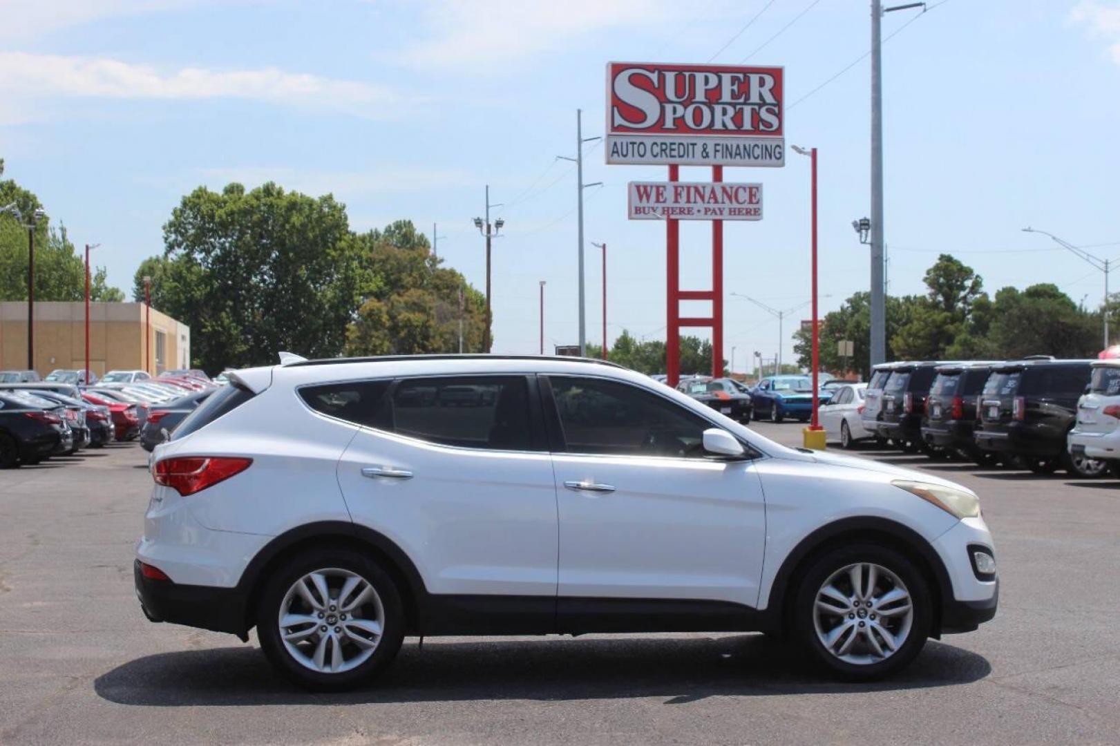 2013 White Hyundai Santa Fe Sport 2.0 FWD (5XYZU3LA8DG) with an 2.0L L4 DOHC 16V engine, 6-Speed Automatic transmission, located at 4301 NW 39th , Oklahoma City, OK, 73112, (405) 949-5600, 35.512135, -97.598671 - NO DRIVERS LICENCE NO-FULL COVERAGE INSURANCE-NO CREDIT CHECK. COME ON OVER TO SUPERSPORTS AND TAKE A LOOK AND TEST DRIVE PLEASE GIVE US A CALL AT (405) 949-5600. NO LICENSIA DE MANEJAR- NO SEGURO DE COBERTURA TOTAL- NO VERIFICACCION DE CREDITO. POR FAVOR VENGAN A SUPERSPORTS, ECHE UN V - Photo#3