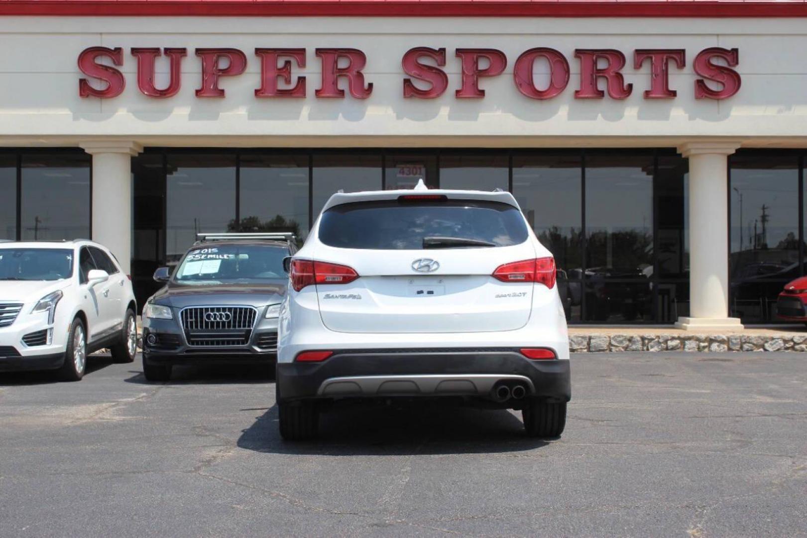 2013 White Hyundai Santa Fe Sport 2.0 FWD (5XYZU3LA8DG) with an 2.0L L4 DOHC 16V engine, 6-Speed Automatic transmission, located at 4301 NW 39th , Oklahoma City, OK, 73112, (405) 949-5600, 35.512135, -97.598671 - NO DRIVERS LICENCE NO-FULL COVERAGE INSURANCE-NO CREDIT CHECK. COME ON OVER TO SUPERSPORTS AND TAKE A LOOK AND TEST DRIVE PLEASE GIVE US A CALL AT (405) 949-5600. NO LICENSIA DE MANEJAR- NO SEGURO DE COBERTURA TOTAL- NO VERIFICACCION DE CREDITO. POR FAVOR VENGAN A SUPERSPORTS, ECHE UN V - Photo#4