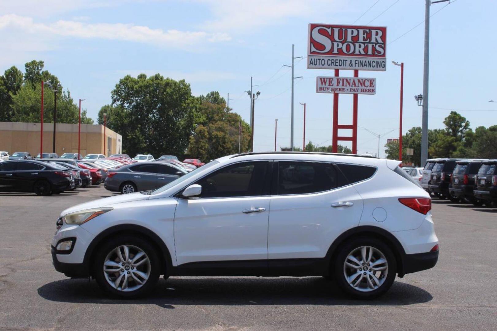 2013 White Hyundai Santa Fe Sport 2.0 FWD (5XYZU3LA8DG) with an 2.0L L4 DOHC 16V engine, 6-Speed Automatic transmission, located at 4301 NW 39th , Oklahoma City, OK, 73112, (405) 949-5600, 35.512135, -97.598671 - NO DRIVERS LICENCE NO-FULL COVERAGE INSURANCE-NO CREDIT CHECK. COME ON OVER TO SUPERSPORTS AND TAKE A LOOK AND TEST DRIVE PLEASE GIVE US A CALL AT (405) 949-5600. NO LICENSIA DE MANEJAR- NO SEGURO DE COBERTURA TOTAL- NO VERIFICACCION DE CREDITO. POR FAVOR VENGAN A SUPERSPORTS, ECHE UN V - Photo#6