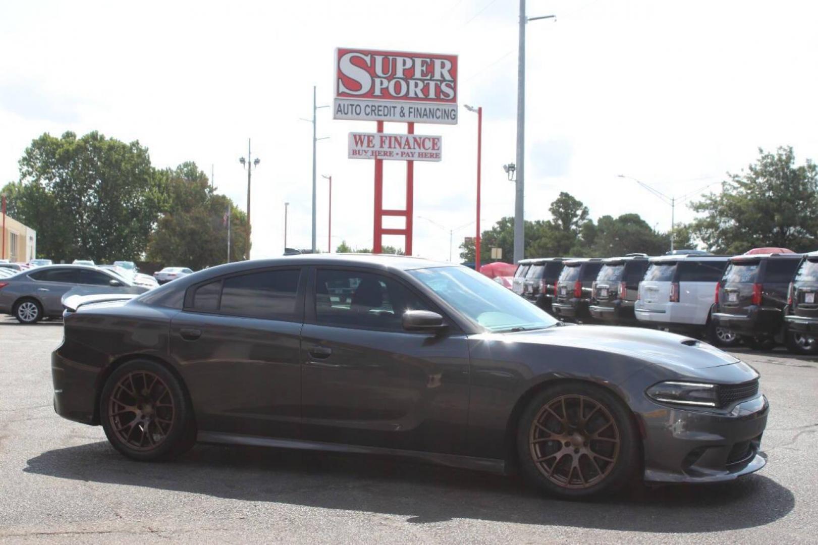 2018 Charcoal Dodge Charger SRT 392 (2C3CDXGJ9JH) with an 6.4L V8 OHV 16V engine, 5A transmission, located at 4301 NW 39th , Oklahoma City, OK, 73112, (405) 949-5600, 35.512135, -97.598671 - NO DRIVERS LICENCE NO-FULL COVERAGE INSURANCE-NO CREDIT CHECK. COME ON OVER TO SUPERSPORTS AND TAKE A LOOK AND TEST DRIVE. PLEASE GIVE US A CALL AT (405) 949-5600. NO LICENSIA DE MANEJAR- NO SEGURO DE COBERTURA TOTAL- NO VERIFICACCION DE CREDITO. POR FAVOR VENGAN A SUPERSPORTS, ECHE UN - Photo#3