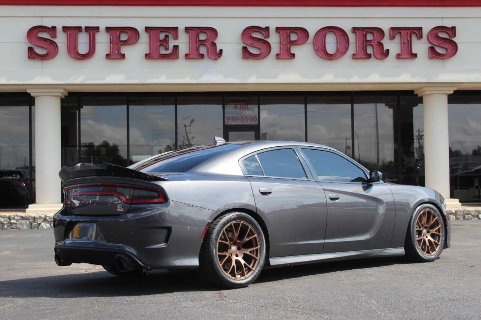 2018 Charcoal Dodge Charger SRT 392 (2C3CDXGJ9JH) with an 6.4L V8 OHV 16V engine, 5A transmission, located at 4301 NW 39th , Oklahoma City, OK, 73112, (405) 949-5600, 35.512135, -97.598671 - NO DRIVERS LICENCE NO-FULL COVERAGE INSURANCE-NO CREDIT CHECK. COME ON OVER TO SUPERSPORTS AND TAKE A LOOK AND TEST DRIVE. PLEASE GIVE US A CALL AT (405) 949-5600. NO LICENSIA DE MANEJAR- NO SEGURO DE COBERTURA TOTAL- NO VERIFICACCION DE CREDITO. POR FAVOR VENGAN A SUPERSPORTS, ECHE UN - Photo#4