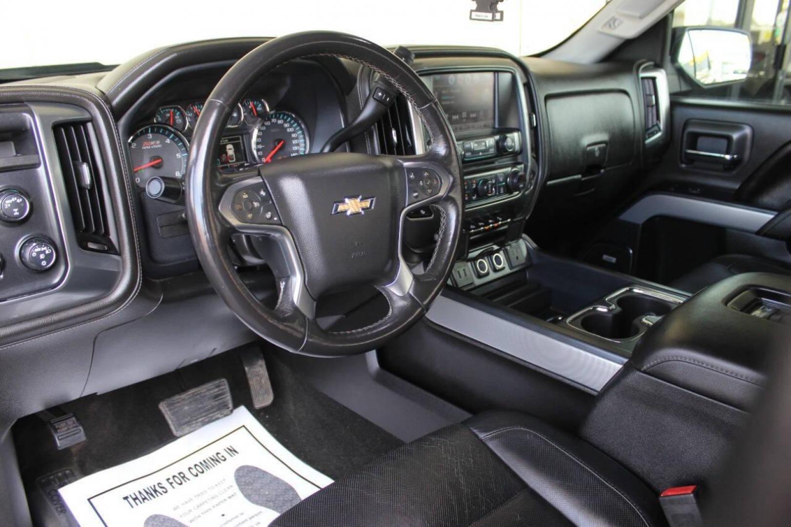 2017 Black Chevrolet Silverado 1500 LTZ Crew Cab Long Box 4WD (3GCUKSEC7HG) with an 5.3L V8 OHV 16V engine, 6A transmission, located at 4301 NW 39th , Oklahoma City, OK, 73112, (405) 949-5600, 35.512135, -97.598671 - NO DRIVERS LICENCE NO-FULL COVERAGE INSURANCE-NO CREDIT CHECK. COME ON OVER TO SUPERSPORTS AND TAKE A LOOK AND TEST DRIVE PLEASE GIVE US A CALL AT (405) 949-5600. NO LICENSIA DE MANEJAR- NO SEGURO DE COBERTURA TOTAL- NO VERIFICACCION DE CREDITO. POR FAVOR VENGAN A SUPERSPORTS, ECHE UN V - Photo#17