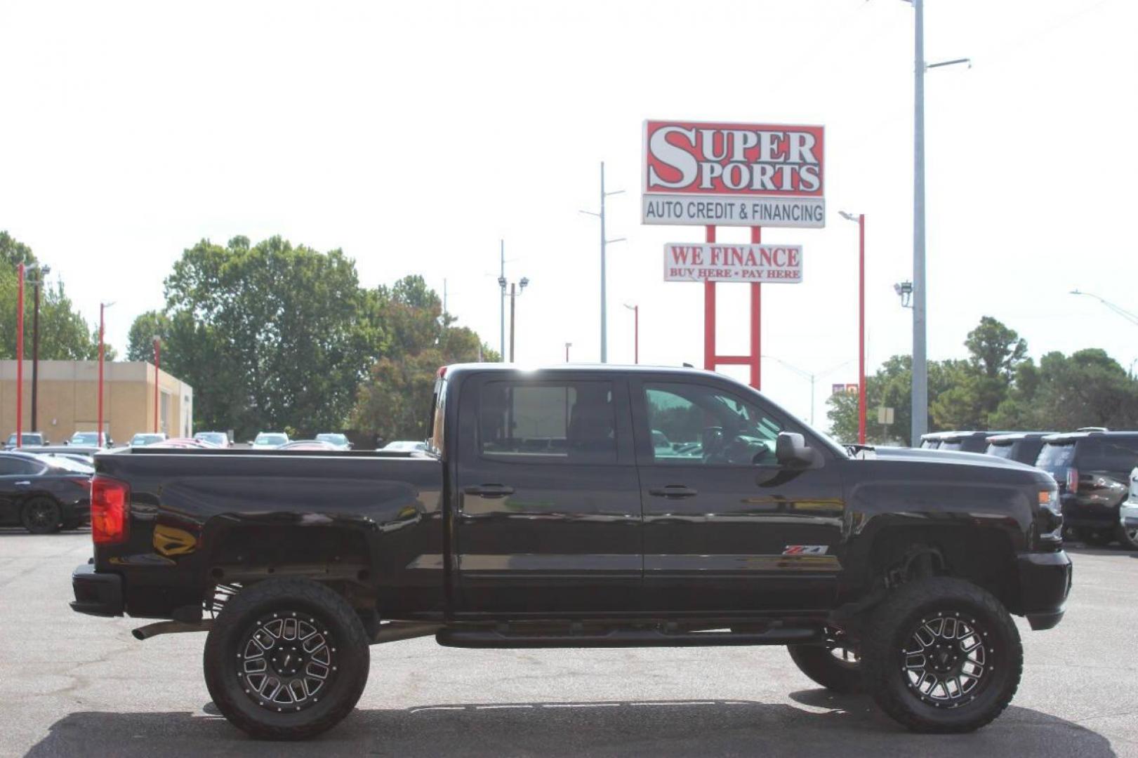 2017 Black Chevrolet Silverado 1500 LTZ Crew Cab Long Box 4WD (3GCUKSEC7HG) with an 5.3L V8 OHV 16V engine, 6A transmission, located at 4301 NW 39th , Oklahoma City, OK, 73112, (405) 949-5600, 35.512135, -97.598671 - NO DRIVERS LICENCE NO-FULL COVERAGE INSURANCE-NO CREDIT CHECK. COME ON OVER TO SUPERSPORTS AND TAKE A LOOK AND TEST DRIVE PLEASE GIVE US A CALL AT (405) 949-5600. NO LICENSIA DE MANEJAR- NO SEGURO DE COBERTURA TOTAL- NO VERIFICACCION DE CREDITO. POR FAVOR VENGAN A SUPERSPORTS, ECHE UN V - Photo#3