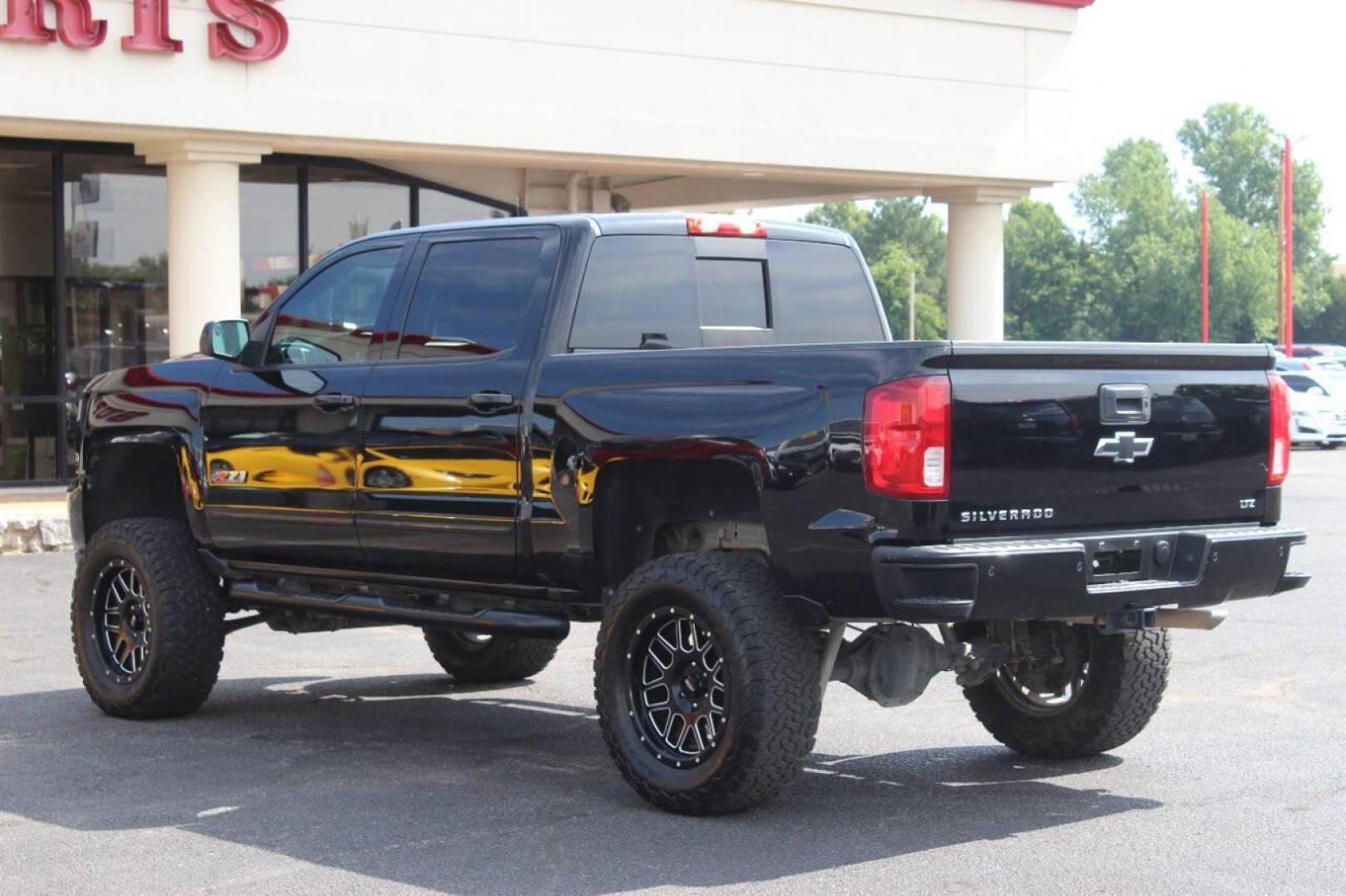 2017 Black Chevrolet Silverado 1500 LTZ Crew Cab Long Box 4WD (3GCUKSEC7HG) with an 5.3L V8 OHV 16V engine, 6A transmission, located at 4301 NW 39th , Oklahoma City, OK, 73112, (405) 949-5600, 35.512135, -97.598671 - NO DRIVERS LICENCE NO-FULL COVERAGE INSURANCE-NO CREDIT CHECK. COME ON OVER TO SUPERSPORTS AND TAKE A LOOK AND TEST DRIVE PLEASE GIVE US A CALL AT (405) 949-5600. NO LICENSIA DE MANEJAR- NO SEGURO DE COBERTURA TOTAL- NO VERIFICACCION DE CREDITO. POR FAVOR VENGAN A SUPERSPORTS, ECHE UN V - Photo#5