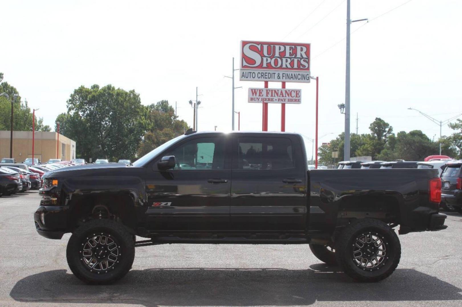 2017 Black Chevrolet Silverado 1500 LTZ Crew Cab Long Box 4WD (3GCUKSEC7HG) with an 5.3L V8 OHV 16V engine, 6A transmission, located at 4301 NW 39th , Oklahoma City, OK, 73112, (405) 949-5600, 35.512135, -97.598671 - NO DRIVERS LICENCE NO-FULL COVERAGE INSURANCE-NO CREDIT CHECK. COME ON OVER TO SUPERSPORTS AND TAKE A LOOK AND TEST DRIVE PLEASE GIVE US A CALL AT (405) 949-5600. NO LICENSIA DE MANEJAR- NO SEGURO DE COBERTURA TOTAL- NO VERIFICACCION DE CREDITO. POR FAVOR VENGAN A SUPERSPORTS, ECHE UN V - Photo#6