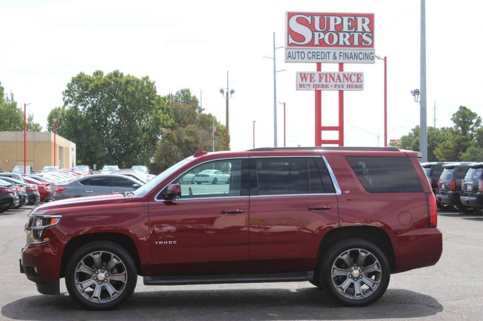 2016 Maroon Chevrolet Tahoe LT 4WD (1GNSKBKC6GR) with an 5.3L V8 OHV 16V engine, 6A transmission, located at 4301 NW 39th , Oklahoma City, OK, 73112, (405) 949-5600, 35.512135, -97.598671 - NO DRIVERS LICENCE NO-FULL COVERAGE INSURANCE-NO CREDIT CHECK. COME ON OVER TO SUPERSPORTS AND TAKE A LOOK AND TEST DRIVE. PLEASE GIVE US A CALL AT (405) 949-5600. NO LICENSIA DE MANEJAR- NO SEGURO DE COBERTURA TOTAL- NO VERIFICACCION DE CREDITO. POR FAVOR VENGAN A SUPERSPORTS, ECHE UN - Photo#6