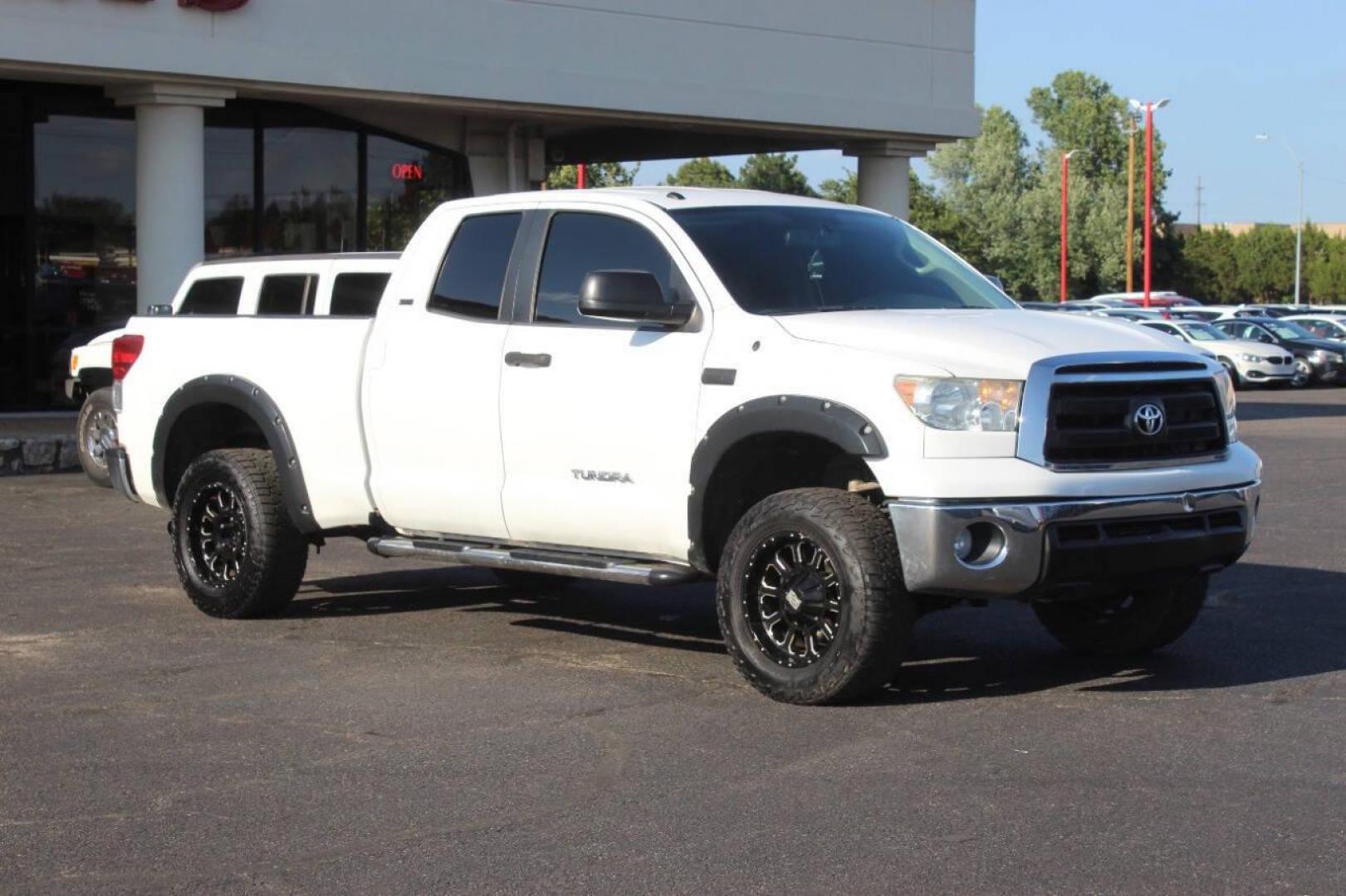 2013 Black Toyota Tundra Tundra-Grade 5.7L FFV Double Cab 4WD (5TFUW5F10DX) with an 5.7L V8 DOHC 32V FFV engine, 6-Speed Automatic Overdrive transmission, located at 4301 NW 39th , Oklahoma City, OK, 73112, (405) 949-5600, 35.512135, -97.598671 - NO DRIVERS LICENCE NO-FULL COVERAGE INSURANCE-NO CREDIT CHECK. COME ON OVER TO SUPERSPORTS AND TAKE A LOOK AND TEST DRIVE. PLEASE GIVE US A CALL AT (405) 949-5600. NO LICENSIA DE MANEJAR- NO SEGURO DE COBERTURA TOTAL- NO VERIFICACCION DE CREDITO. POR FAVOR VENGAN A SUPERSPORTS, ECHE UN - Photo#0