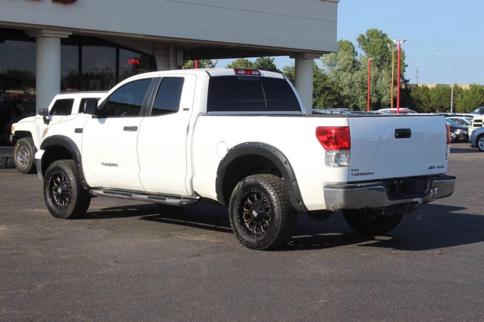 2013 Black Toyota Tundra Tundra-Grade 5.7L FFV Double Cab 4WD (5TFUW5F10DX) with an 5.7L V8 DOHC 32V FFV engine, 6-Speed Automatic Overdrive transmission, located at 4301 NW 39th , Oklahoma City, OK, 73112, (405) 949-5600, 35.512135, -97.598671 - NO DRIVERS LICENCE NO-FULL COVERAGE INSURANCE-NO CREDIT CHECK. COME ON OVER TO SUPERSPORTS AND TAKE A LOOK AND TEST DRIVE. PLEASE GIVE US A CALL AT (405) 949-5600. NO LICENSIA DE MANEJAR- NO SEGURO DE COBERTURA TOTAL- NO VERIFICACCION DE CREDITO. POR FAVOR VENGAN A SUPERSPORTS, ECHE UN - Photo#5