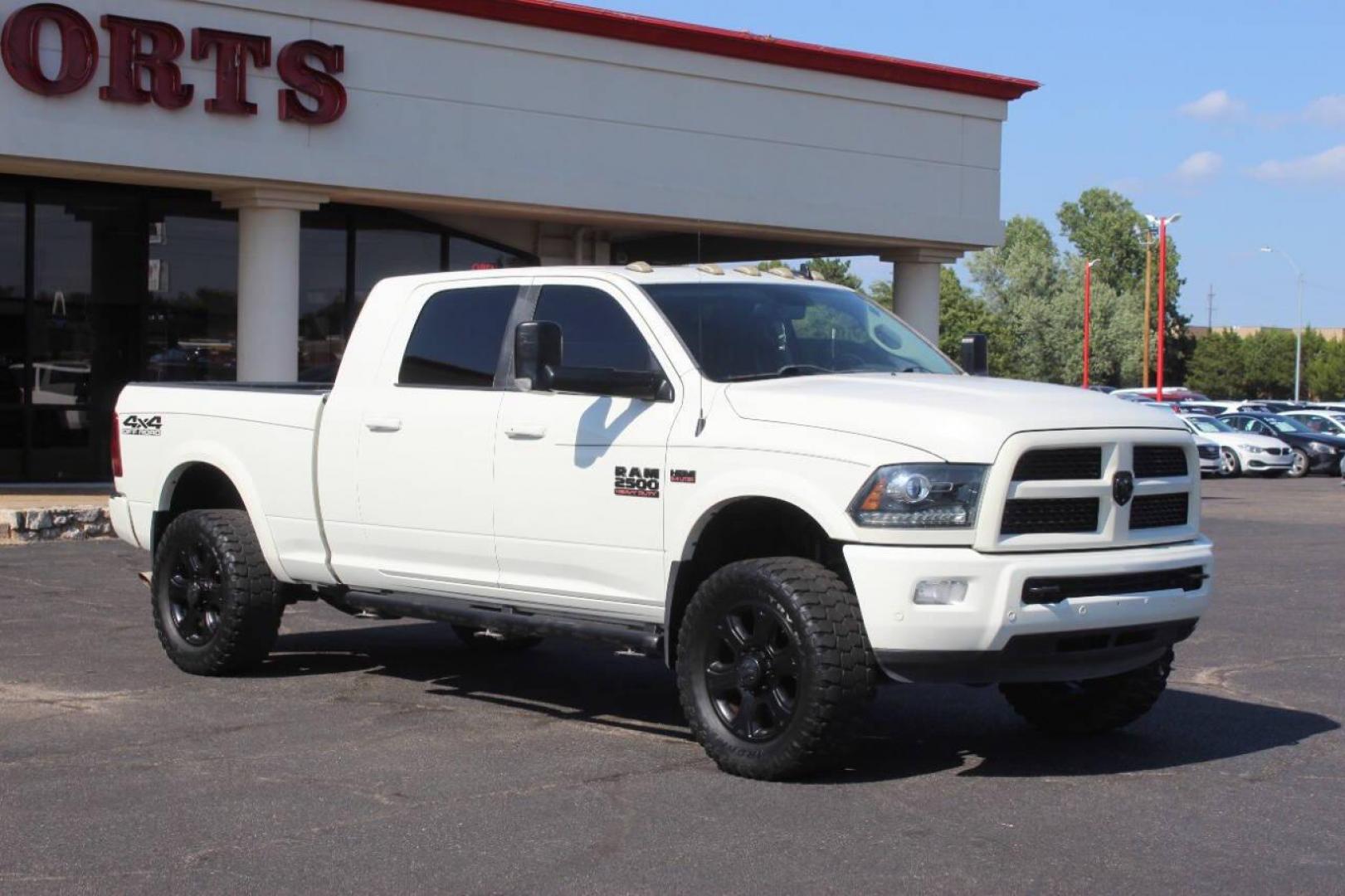 2016 Off White RAM 2500 Laramie Mega Cab 4WD (3C6UR5NJXGG) with an 6.4L V8 engine, 6A transmission, located at 4301 NW 39th , Oklahoma City, OK, 73112, (405) 949-5600, 35.512135, -97.598671 - NO DRIVERS LICENCE NO-FULL COVERAGE INSURANCE-NO CREDIT CHECK. COME ON OVER TO SUPERSPORTS AND TAKE A LOOK AND TEST DRIVE. PLEASE GIVE US A CALL AT (405) 949-5600. NO LICENSIA DE MANEJAR- NO SEGURO DE COBERTURA TOTAL- NO VERIFICACCION DE CREDITO. POR FAVOR VENGAN A SUPERSPORTS, ECHE UN - Photo#0