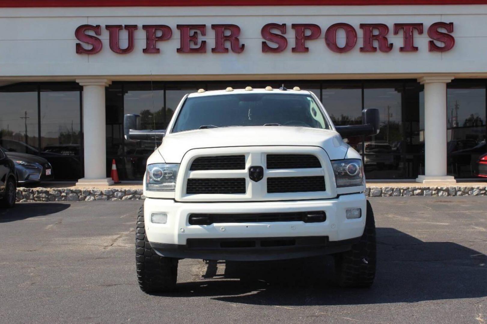 2016 Off White RAM 2500 Laramie Mega Cab 4WD (3C6UR5NJXGG) with an 6.4L V8 engine, 6A transmission, located at 4301 NW 39th , Oklahoma City, OK, 73112, (405) 949-5600, 35.512135, -97.598671 - NO DRIVERS LICENCE NO-FULL COVERAGE INSURANCE-NO CREDIT CHECK. COME ON OVER TO SUPERSPORTS AND TAKE A LOOK AND TEST DRIVE. PLEASE GIVE US A CALL AT (405) 949-5600. NO LICENSIA DE MANEJAR- NO SEGURO DE COBERTURA TOTAL- NO VERIFICACCION DE CREDITO. POR FAVOR VENGAN A SUPERSPORTS, ECHE UN - Photo#2