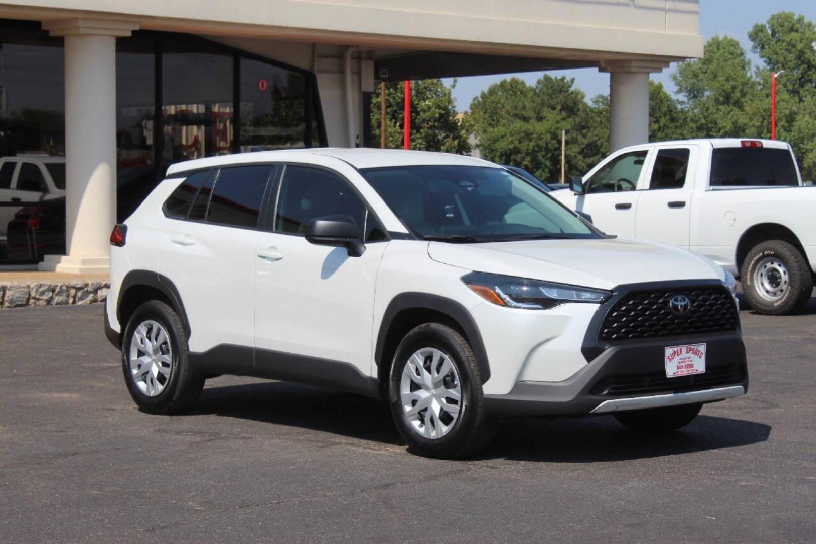 2023 White Toyota Corolla Cross L AWD (7MUAAAAG1PV) with an 2.0L L4 DOHC 16V engine, CVT transmission, located at 4301 NW 39th , Oklahoma City, OK, 73112, (405) 949-5600, 35.512135, -97.598671 - NO DRIVERS LICENCE NO-FULL COVERAGE INSURANCE-NO CREDIT CHECK. COME ON OVER TO SUPERSPORTS AND TAKE A LOOK AND TEST DRIVE. PLEASE GIVE US A CALL AT (405) 949-5600. NO LICENSIA DE MANEJAR- NO SEGURO DE COBERTURA TOTAL- NO VERIFICACCION DE CREDITO. POR FAVOR VENGAN A SUPERSPORTS, ECHE UN - Photo#0