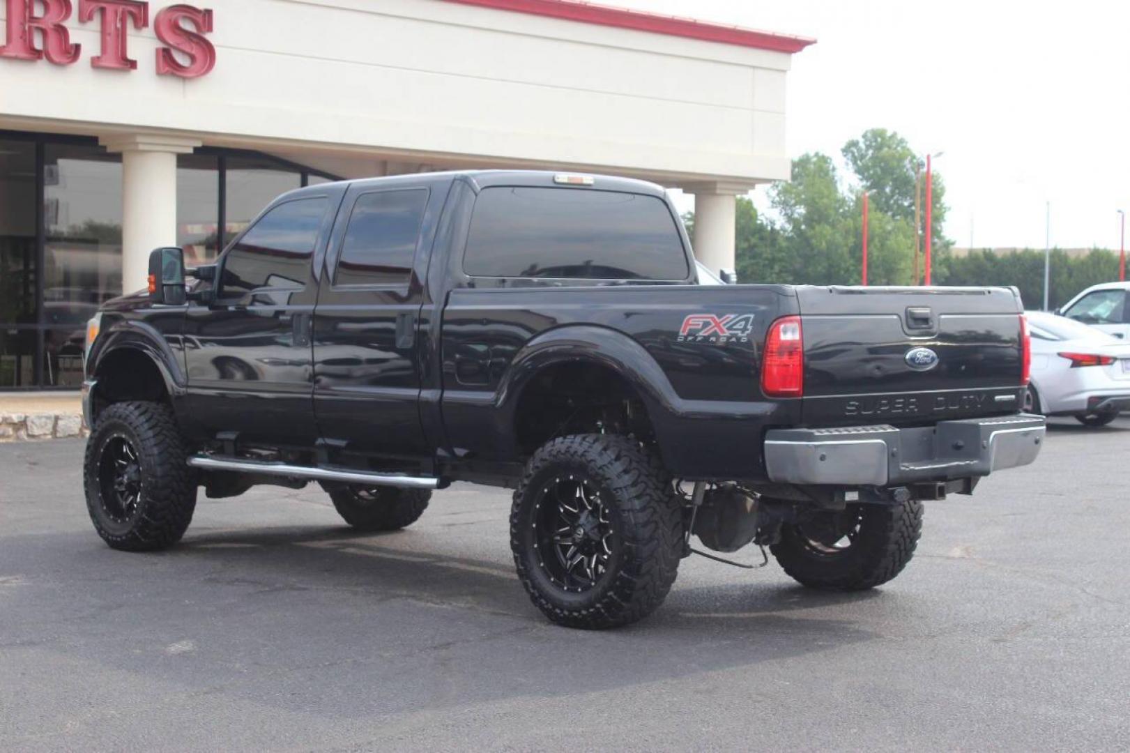 2013 Black Ford F-250 SD King Ranch Crew Cab 4WD (1FT7W2B68DE) with an 6.2L V8 OHV 16V engine, 6-Speed Automatic transmission, located at 4301 NW 39th , Oklahoma City, OK, 73112, (405) 949-5600, 35.512135, -97.598671 - NO DRIVERS LICENCE NO-FULL COVERAGE INSURANCE-NO CREDIT CHECK. COME ON OVER TO SUPERSPORTS AND TAKE A LOOK AND TEST DRIVE. PLEASE GIVE US A CALL AT (405) 949-5600. NO LICENSIA DE MANEJAR- NO SEGURO DE COBERTURA TOTAL- NO VERIFICACCION DE CREDITO. POR FAVOR VENGAN A SUPERSPORTS, ECHE UN - Photo#5