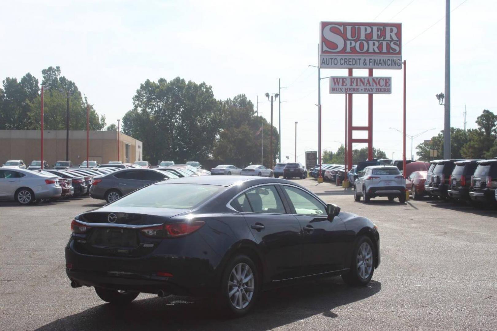 2016 Blue Mazda Mazda6 i Sport AT (JM1GJ1U52G1) with an 2.5L L4 DOHC 16V engine, 6-Speed Automatic transmission, located at 4301 NW 39th , Oklahoma City, OK, 73112, (405) 949-5600, 35.512135, -97.598671 - NO DRIVERS LICENCE NO-FULL COVERAGE INSURANCE-NO CREDIT CHECK. COME ON OVER TO SUPERSPORTS AND TAKE A LOOK AND TEST DRIVE. PLEASE GIVE US A CALL AT (405) 949-5600. NO LICENSIA DE MANEJAR- NO SEGURO DE COBERTURA TOTAL- NO VERIFICACCION DE CREDITO. POR FAVOR VENGAN A SUPERSPORTS, ECHE UN - Photo#3