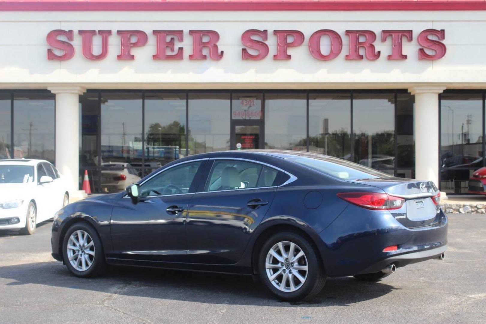 2016 Blue Mazda Mazda6 i Sport AT (JM1GJ1U52G1) with an 2.5L L4 DOHC 16V engine, 6-Speed Automatic transmission, located at 4301 NW 39th , Oklahoma City, OK, 73112, (405) 949-5600, 35.512135, -97.598671 - NO DRIVERS LICENCE NO-FULL COVERAGE INSURANCE-NO CREDIT CHECK. COME ON OVER TO SUPERSPORTS AND TAKE A LOOK AND TEST DRIVE. PLEASE GIVE US A CALL AT (405) 949-5600. NO LICENSIA DE MANEJAR- NO SEGURO DE COBERTURA TOTAL- NO VERIFICACCION DE CREDITO. POR FAVOR VENGAN A SUPERSPORTS, ECHE UN - Photo#4