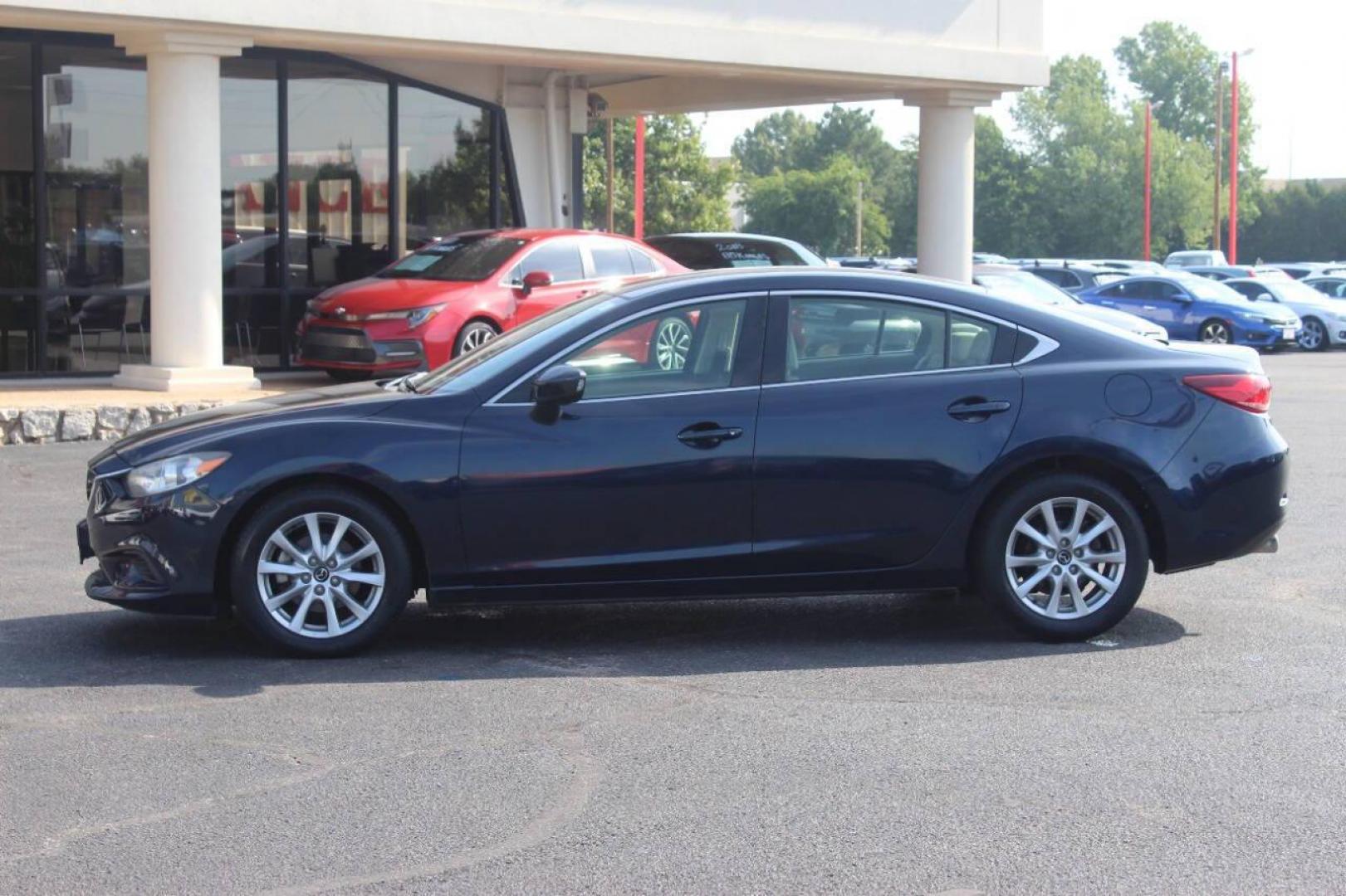 2016 Blue Mazda Mazda6 i Sport AT (JM1GJ1U52G1) with an 2.5L L4 DOHC 16V engine, 6-Speed Automatic transmission, located at 4301 NW 39th , Oklahoma City, OK, 73112, (405) 949-5600, 35.512135, -97.598671 - NO DRIVERS LICENCE NO-FULL COVERAGE INSURANCE-NO CREDIT CHECK. COME ON OVER TO SUPERSPORTS AND TAKE A LOOK AND TEST DRIVE. PLEASE GIVE US A CALL AT (405) 949-5600. NO LICENSIA DE MANEJAR- NO SEGURO DE COBERTURA TOTAL- NO VERIFICACCION DE CREDITO. POR FAVOR VENGAN A SUPERSPORTS, ECHE UN - Photo#5