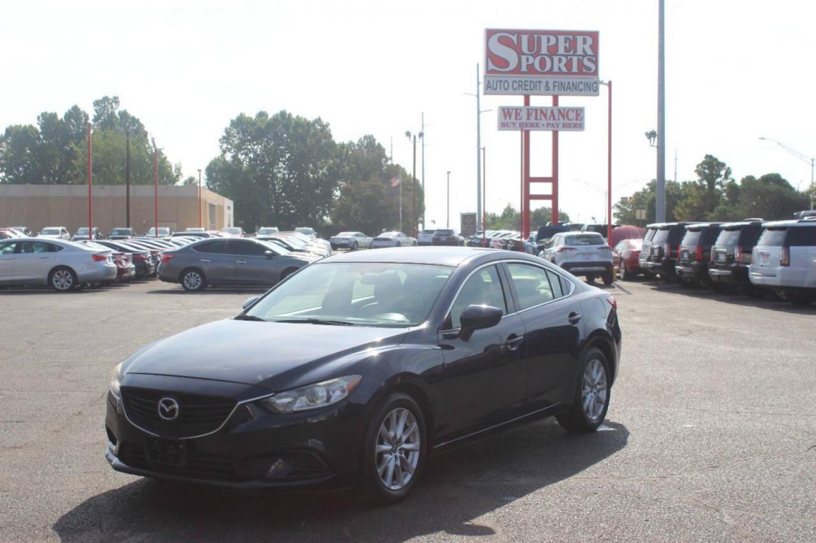 2016 Blue Mazda Mazda6 i Sport AT (JM1GJ1U52G1) with an 2.5L L4 DOHC 16V engine, 6-Speed Automatic transmission, located at 4301 NW 39th , Oklahoma City, OK, 73112, (405) 949-5600, 35.512135, -97.598671 - NO DRIVERS LICENCE NO-FULL COVERAGE INSURANCE-NO CREDIT CHECK. COME ON OVER TO SUPERSPORTS AND TAKE A LOOK AND TEST DRIVE. PLEASE GIVE US A CALL AT (405) 949-5600. NO LICENSIA DE MANEJAR- NO SEGURO DE COBERTURA TOTAL- NO VERIFICACCION DE CREDITO. POR FAVOR VENGAN A SUPERSPORTS, ECHE UN - Photo#6