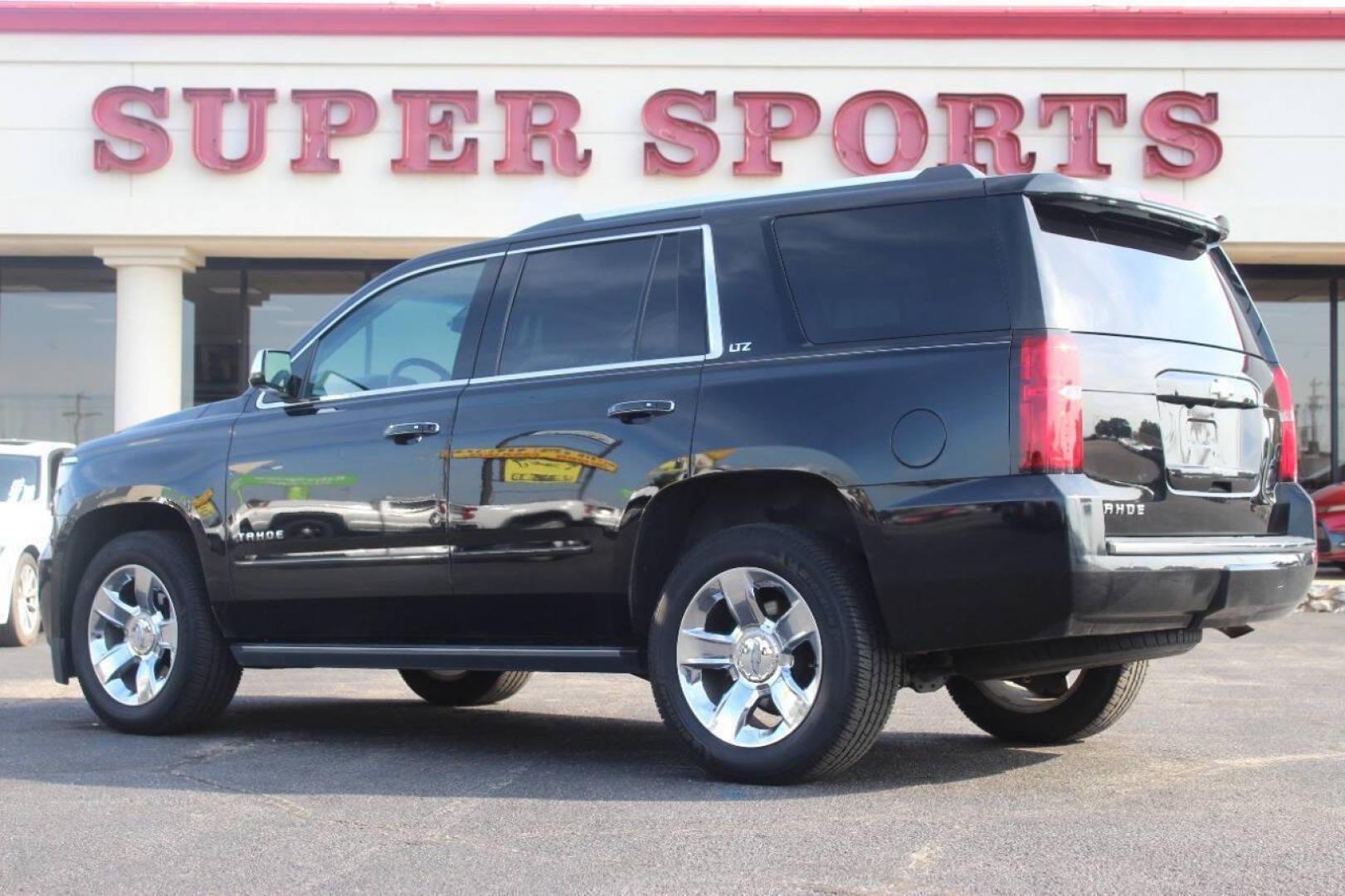 2015 Black Chevrolet Tahoe LTZ 4WD (1GNSKCKC9FR) with an 5.3L V8 OHV 16V engine, 6-Speed Automatic transmission, located at 4301 NW 39th , Oklahoma City, OK, 73112, (405) 949-5600, 35.512135, -97.598671 - NO DRIVERS LICENCE NO-FULL COVERAGE INSURANCE-NO CREDIT CHECK. COME ON OVER TO SUPERSPORTS AND TAKE A LOOK AND TEST DRIVE. PLEASE GIVE US A CALL AT (405) 949-5600. NO LICENSIA DE MANEJAR- NO SEGURO DE COBERTURA TOTAL- NO VERIFICACCION DE CREDITO. POR FAVOR VENGAN A SUPERSPORTS, ECHE UN - Photo#4