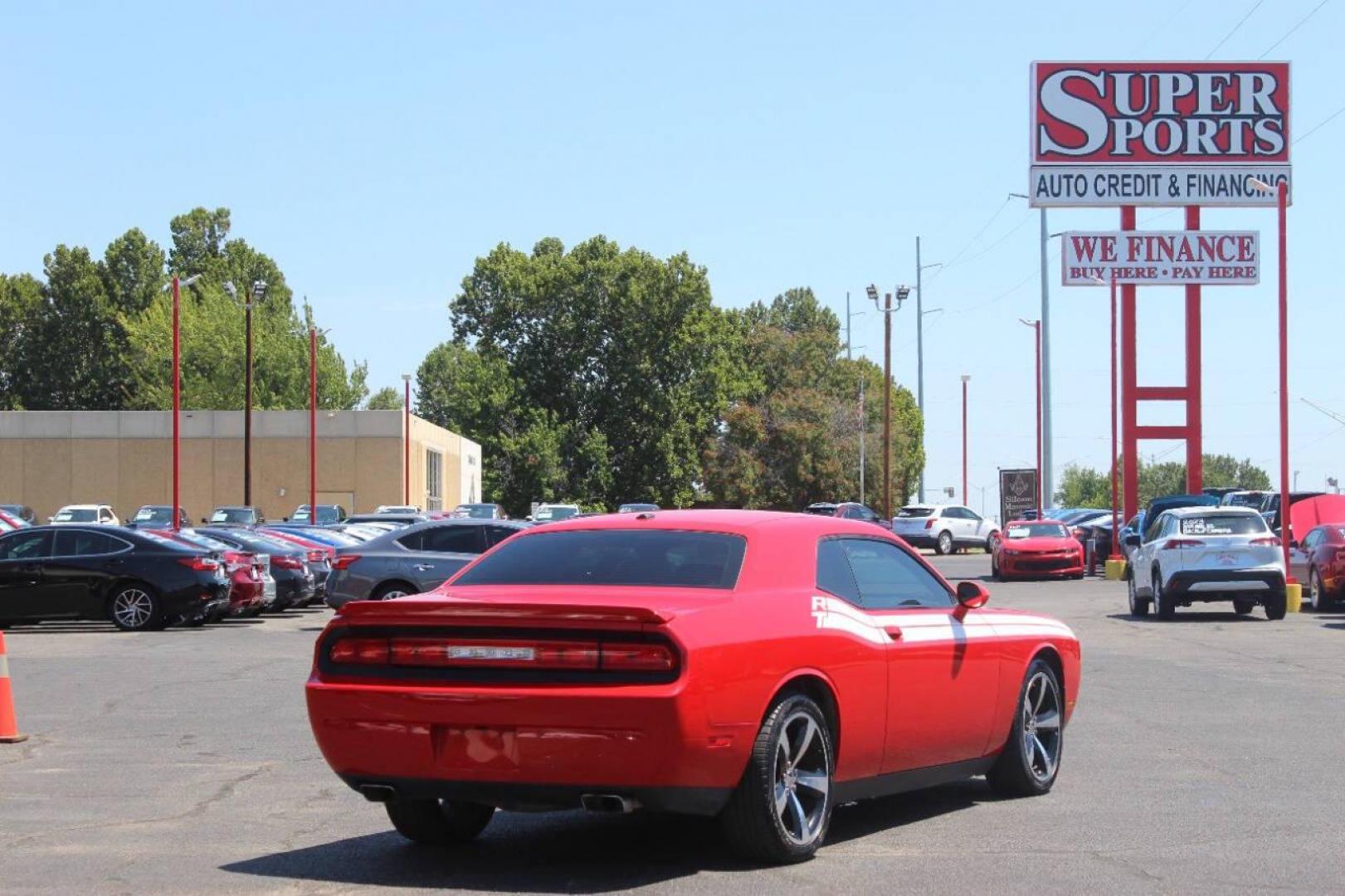 2014 Red Dodge Challenger R/T (2C3CDYBT1EH) with an 5.7L V8 OHV 16V engine, Automatic 5-Speed transmission, located at 4301 NW 39th , Oklahoma City, OK, 73112, (405) 949-5600, 35.512135, -97.598671 - NO DRIVERS LICENCE NO-FULL COVERAGE INSURANCE-NO CREDIT CHECK. COME ON OVER TO SUPERSPORTS AND TAKE A LOOK AND TEST DRIVE. PLEASE GIVE US A CALL AT (405) 949-5600. NO LICENSIA DE MANEJAR- NO SEGURO DE COBERTURA TOTAL- NO VERIFICACCION DE CREDITO. POR FAVOR VENGAN A SUPERSPORTS, ECHE UN - Photo#3