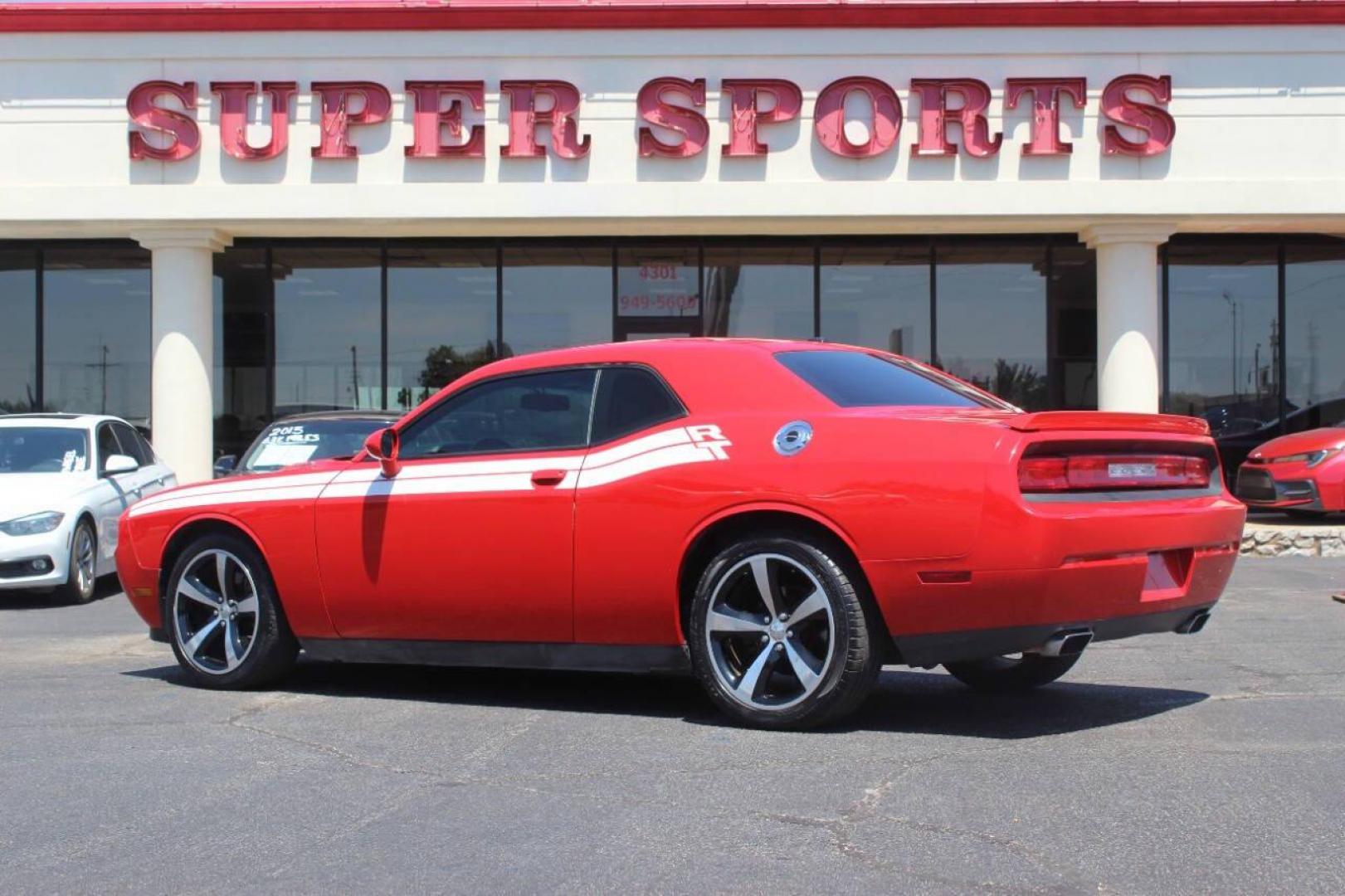 2014 Red Dodge Challenger R/T (2C3CDYBT1EH) with an 5.7L V8 OHV 16V engine, Automatic 5-Speed transmission, located at 4301 NW 39th , Oklahoma City, OK, 73112, (405) 949-5600, 35.512135, -97.598671 - NO DRIVERS LICENCE NO-FULL COVERAGE INSURANCE-NO CREDIT CHECK. COME ON OVER TO SUPERSPORTS AND TAKE A LOOK AND TEST DRIVE. PLEASE GIVE US A CALL AT (405) 949-5600. NO LICENSIA DE MANEJAR- NO SEGURO DE COBERTURA TOTAL- NO VERIFICACCION DE CREDITO. POR FAVOR VENGAN A SUPERSPORTS, ECHE UN - Photo#4