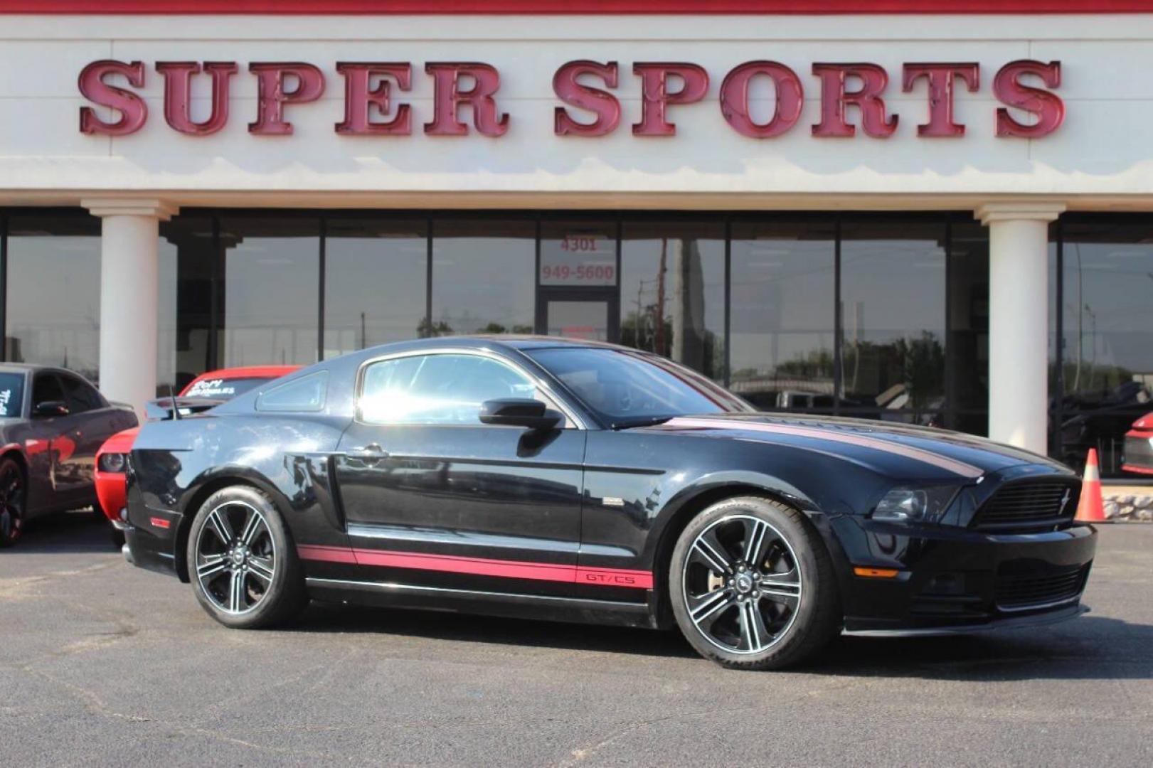 2013 Black Ford Mustang GT Coupe (1ZVBP8CF1D5) with an 5.0L V8 DOHC 32V engine, Manual 6-Speed transmission, located at 4301 NW 39th , Oklahoma City, OK, 73112, (405) 949-5600, 35.512135, -97.598671 - NO DRIVERS LICENCE NO-FULL COVERAGE INSURANCE-NO CREDIT CHECK. COME ON OVER TO SUPERSPORTS AND TAKE A LOOK AND TEST DRIVE. PLEASE GIVE US A CALL AT (405) 949-5600. NO LICENSIA DE MANEJAR- NO SEGURO DE COBERTURA TOTAL- NO VERIFICACCION DE CREDITO. POR FAVOR VENGAN A SUPERSPORTS, ECHE UN - Photo#0