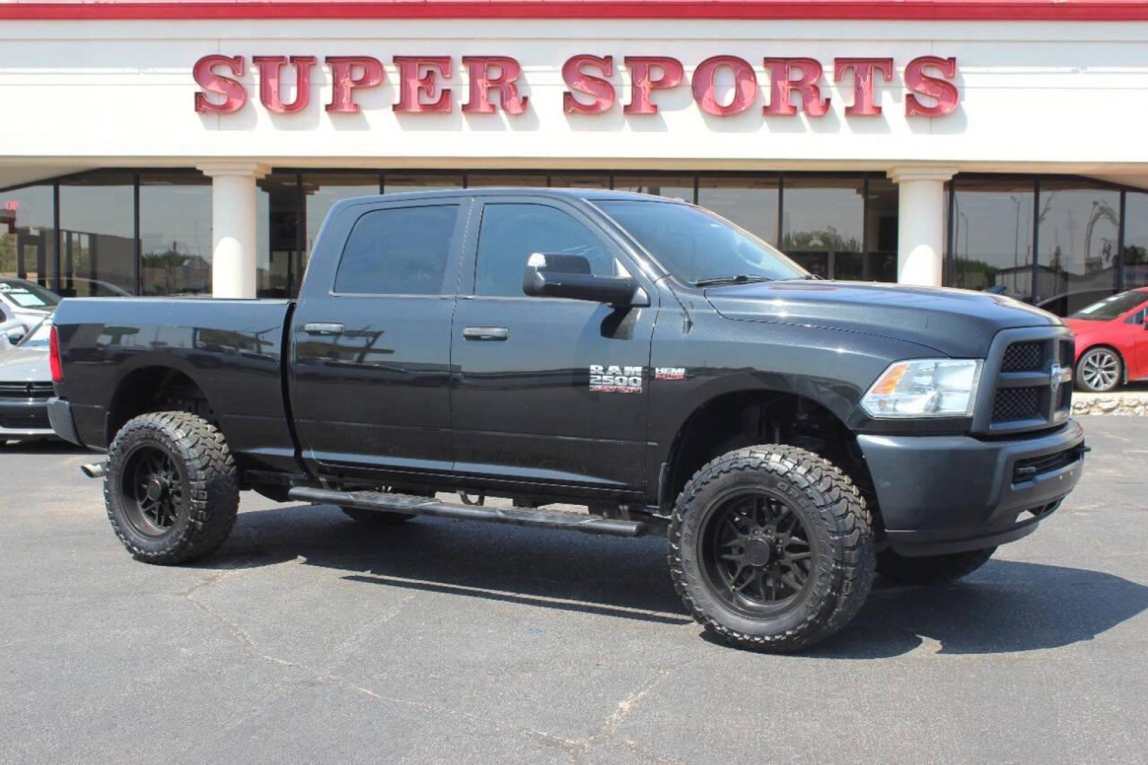 2017 Black RAM 2500 Tradesman Crew Cab SWB 4WD (3C6UR5CJ0HG) with an 6.4L V8 engine, 6A transmission, located at 4301 NW 39th , Oklahoma City, OK, 73112, (405) 949-5600, 35.512135, -97.598671 - NO DRIVERS LICENCE NO-FULL COVERAGE INSURANCE-NO CREDIT CHECK. COME ON OVER TO SUPERSPORTS AND TAKE A LOOK AND TEST DRIVE. PLEASE GIVE US A CALL AT (405) 949-5600. NO LICENSIA DE MANEJAR- NO SEGURO DE COBERTURA TOTAL- NO VERIFICACCION DE CREDITO. POR FAVOR VENGAN A SUPERSPORTS, ECHE UN - Photo#0