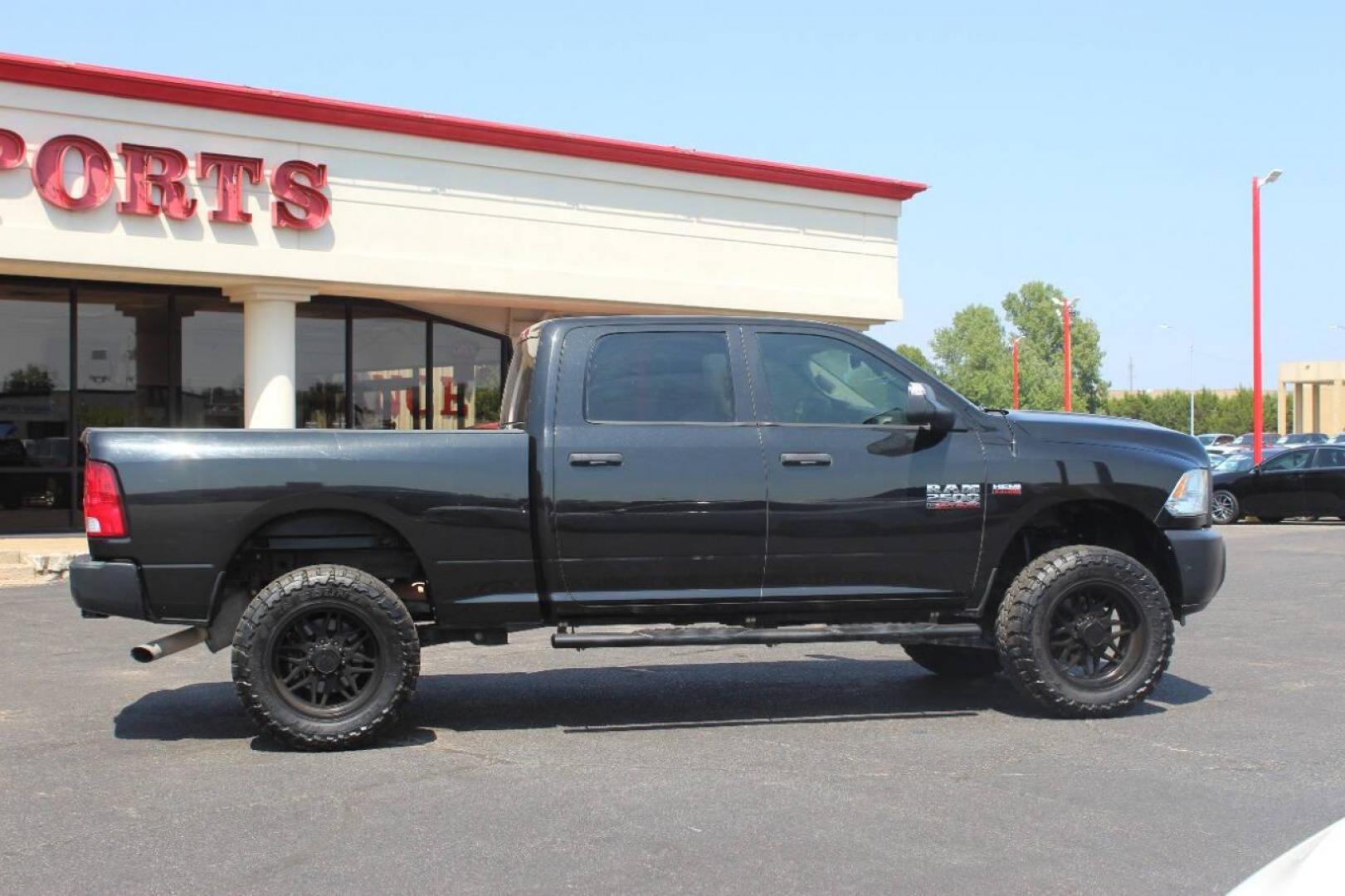 2017 Black RAM 2500 Tradesman Crew Cab SWB 4WD (3C6UR5CJ0HG) with an 6.4L V8 engine, 6A transmission, located at 4301 NW 39th , Oklahoma City, OK, 73112, (405) 949-5600, 35.512135, -97.598671 - NO DRIVERS LICENCE NO-FULL COVERAGE INSURANCE-NO CREDIT CHECK. COME ON OVER TO SUPERSPORTS AND TAKE A LOOK AND TEST DRIVE. PLEASE GIVE US A CALL AT (405) 949-5600. NO LICENSIA DE MANEJAR- NO SEGURO DE COBERTURA TOTAL- NO VERIFICACCION DE CREDITO. POR FAVOR VENGAN A SUPERSPORTS, ECHE UN - Photo#2