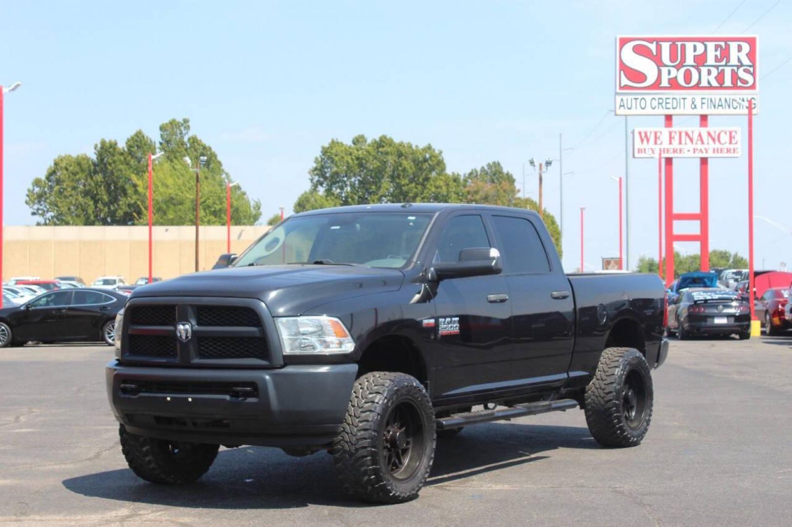 2017 Black RAM 2500 Tradesman Crew Cab SWB 4WD (3C6UR5CJ0HG) with an 6.4L V8 engine, 6A transmission, located at 4301 NW 39th , Oklahoma City, OK, 73112, (405) 949-5600, 35.512135, -97.598671 - NO DRIVERS LICENCE NO-FULL COVERAGE INSURANCE-NO CREDIT CHECK. COME ON OVER TO SUPERSPORTS AND TAKE A LOOK AND TEST DRIVE. PLEASE GIVE US A CALL AT (405) 949-5600. NO LICENSIA DE MANEJAR- NO SEGURO DE COBERTURA TOTAL- NO VERIFICACCION DE CREDITO. POR FAVOR VENGAN A SUPERSPORTS, ECHE UN - Photo#6