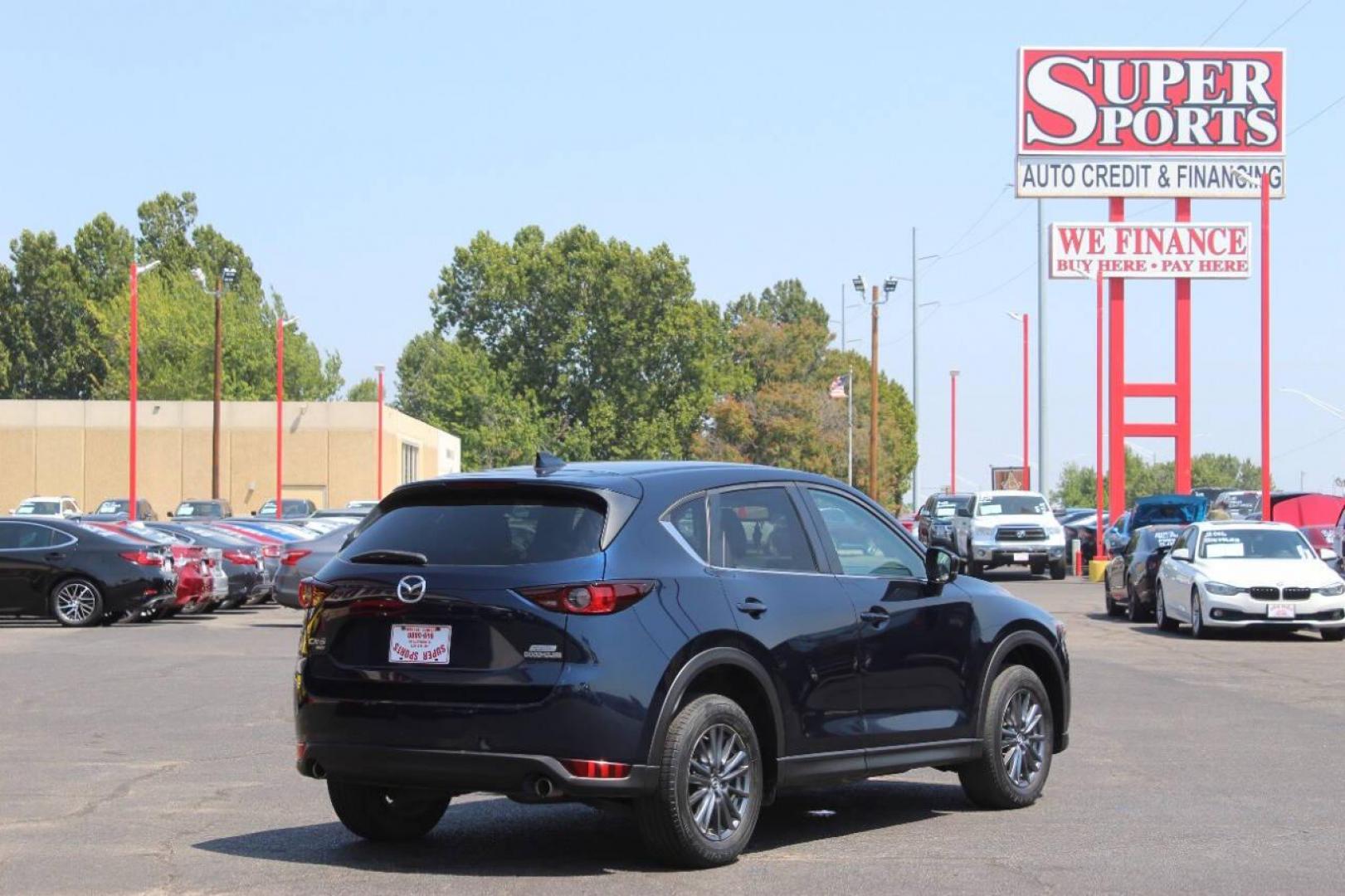 2019 Blue Mazda CX-5 Touring AWD (JM3KFBCMXK1) with an 2.5L L4 DOHC 16V engine, 6A transmission, located at 4301 NW 39th , Oklahoma City, OK, 73112, (405) 949-5600, 35.512135, -97.598671 - NO DRIVERS LICENCE NO-FULL COVERAGE INSURANCE-NO CREDIT CHECK. COME ON OVER TO SUPERSPORTS AND TAKE A LOOK AND TEST DRIVE. PLEASE GIVE US A CALL AT (405) 949-5600. NO LICENSIA DE MANEJAR- NO SEGURO DE COBERTURA TOTAL- NO VERIFICACCION DE CREDITO. POR FAVOR VENGAN A SUPERSPORTS, ECHE UN - Photo#3