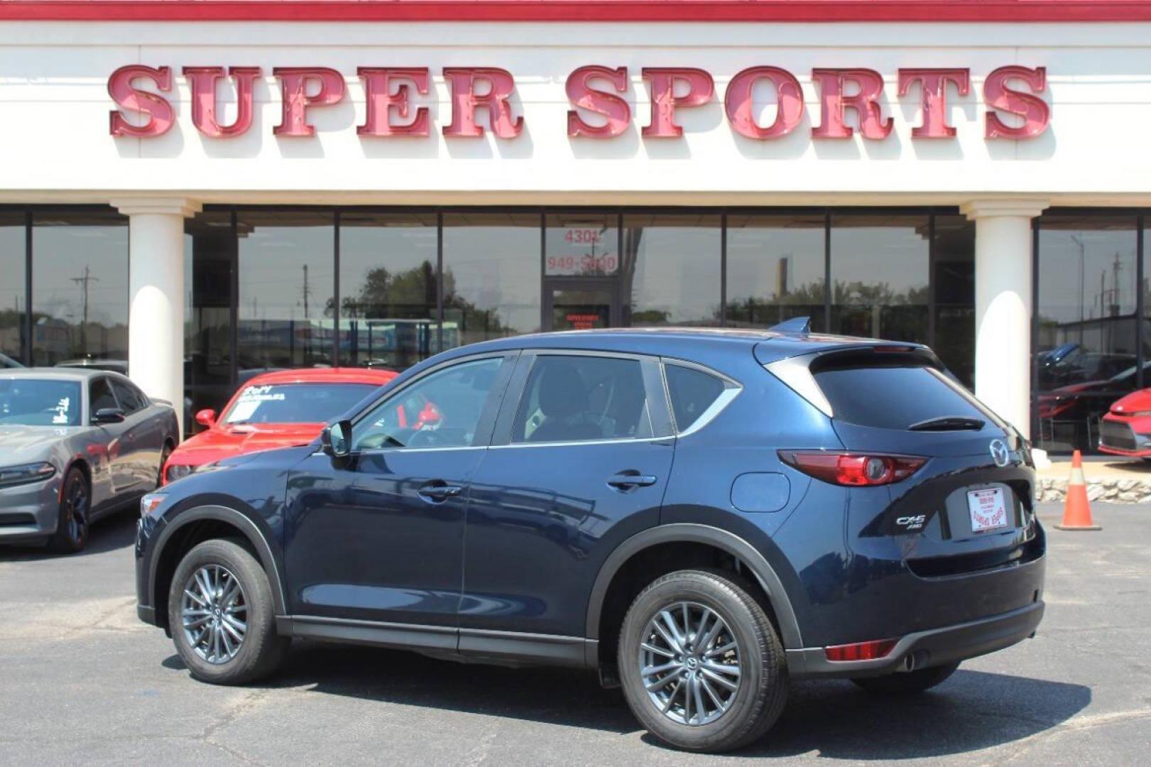 2019 Blue Mazda CX-5 Touring AWD (JM3KFBCMXK1) with an 2.5L L4 DOHC 16V engine, 6A transmission, located at 4301 NW 39th , Oklahoma City, OK, 73112, (405) 949-5600, 35.512135, -97.598671 - NO DRIVERS LICENCE NO-FULL COVERAGE INSURANCE-NO CREDIT CHECK. COME ON OVER TO SUPERSPORTS AND TAKE A LOOK AND TEST DRIVE. PLEASE GIVE US A CALL AT (405) 949-5600. NO LICENSIA DE MANEJAR- NO SEGURO DE COBERTURA TOTAL- NO VERIFICACCION DE CREDITO. POR FAVOR VENGAN A SUPERSPORTS, ECHE UN - Photo#4