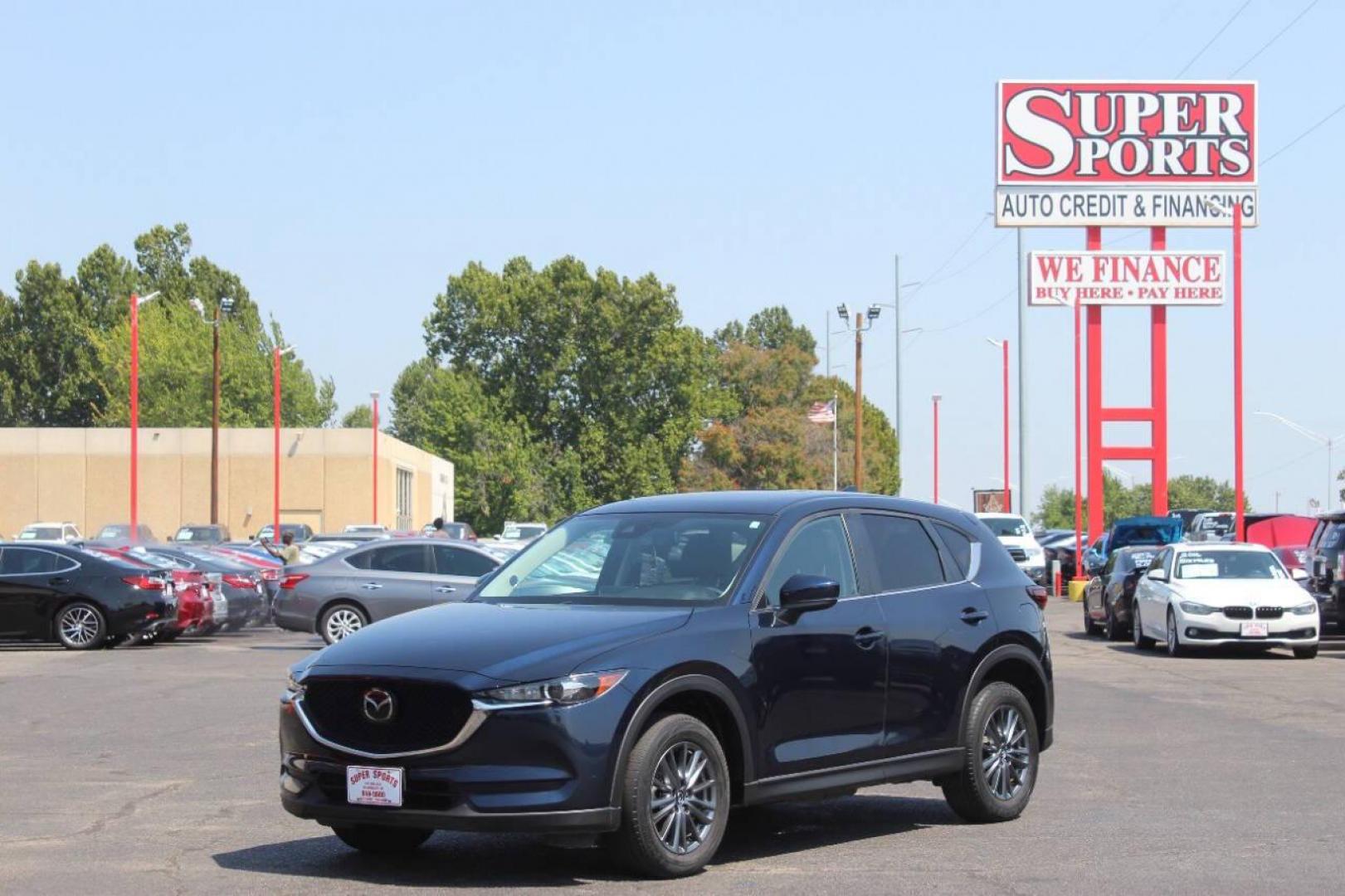 2019 Blue Mazda CX-5 Touring AWD (JM3KFBCMXK1) with an 2.5L L4 DOHC 16V engine, 6A transmission, located at 4301 NW 39th , Oklahoma City, OK, 73112, (405) 949-5600, 35.512135, -97.598671 - NO DRIVERS LICENCE NO-FULL COVERAGE INSURANCE-NO CREDIT CHECK. COME ON OVER TO SUPERSPORTS AND TAKE A LOOK AND TEST DRIVE. PLEASE GIVE US A CALL AT (405) 949-5600. NO LICENSIA DE MANEJAR- NO SEGURO DE COBERTURA TOTAL- NO VERIFICACCION DE CREDITO. POR FAVOR VENGAN A SUPERSPORTS, ECHE UN - Photo#6