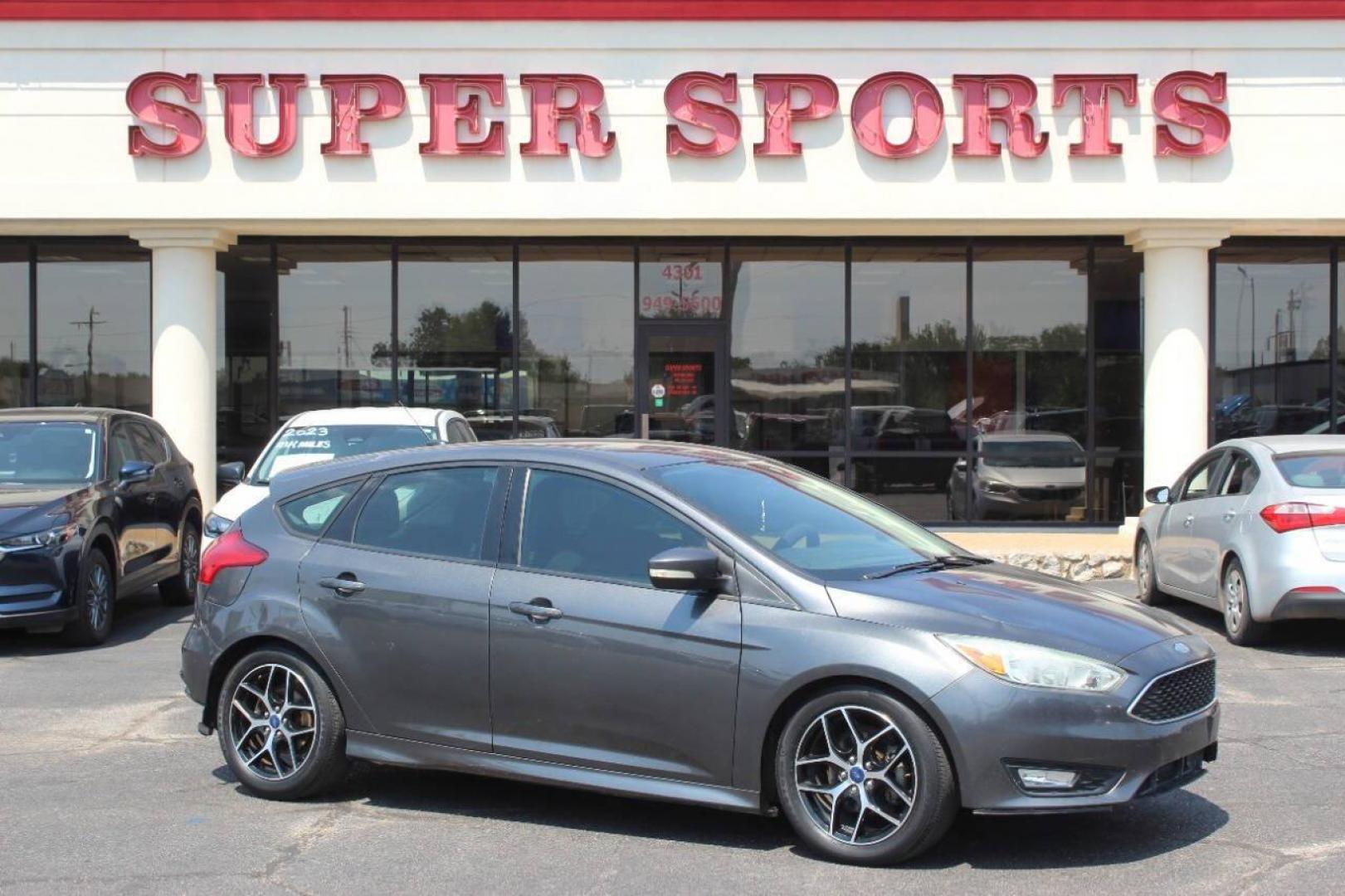 2015 Gray Ford Focus SE Hatch (1FADP3K26FL) with an 2.0L L4 DOHC 16V engine, 5-Speed Manual transmission, located at 4301 NW 39th , Oklahoma City, OK, 73112, (405) 949-5600, 35.512135, -97.598671 - NO DRIVERS LICENCE NO-FULL COVERAGE INSURANCE-NO CREDIT CHECK. COME ON OVER TO SUPERSPORTS AND TAKE A LOOK AND TEST DRIVE. PLEASE GIVE US A CALL AT (405) 949-5600. NO LICENSIA DE MANEJAR- NO SEGURO DE COBERTURA TOTAL- NO VERIFICACCION DE CREDITO. POR FAVOR VENGAN A SUPERSPORTS, ECHE UN - Photo#0