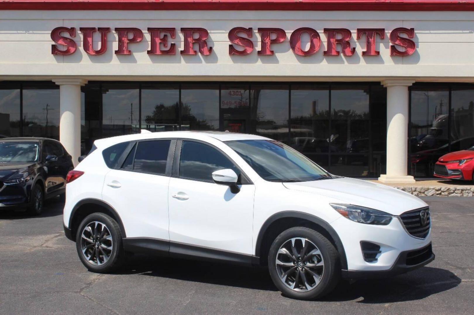 2016 White Mazda CX-5 Grand Touring (JM3KE2DY8G0) with an 2.5L L4 DOHC 16V engine, 6-Speed Automatic transmission, located at 4301 NW 39th , Oklahoma City, OK, 73112, (405) 949-5600, 35.512135, -97.598671 - NO DRIVERS LICENCE NO-FULL COVERAGE INSURANCE-NO CREDIT CHECK. COME ON OVER TO SUPERSPORTS AND TAKE A LOOK AND TEST DRIVE. PLEASE GIVE US A CALL AT (405) 949-5600. NO LICENSIA DE MANEJAR- NO SEGURO DE COBERTURA TOTAL- NO VERIFICACCION DE CREDITO. POR FAVOR VENGAN A SUPERSPORTS, ECHE UN - Photo#0