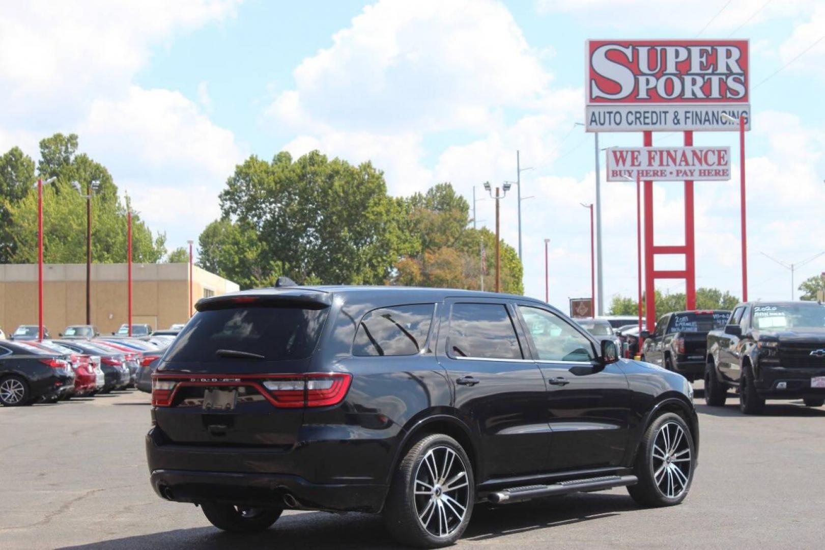 2014 Black Dodge Durango R/T AWD (1C4SDJCT1EC) with an 5.7L V8 OHV 16V engine, 8-Speed Automatic transmission, located at 4301 NW 39th , Oklahoma City, OK, 73112, (405) 949-5600, 35.512135, -97.598671 - NO DRIVERS LICENCE NO-FULL COVERAGE INSURANCE-NO CREDIT CHECK. COME ON OVER TO SUPERSPORTS AND TAKE A LOOK AND TEST DRIVE. PLEASE GIVE US A CALL AT (405) 949-5600. NO LICENSIA DE MANEJAR- NO SEGURO DE COBERTURA TOTAL- NO VERIFICACCION DE CREDITO. POR FAVOR VENGAN A SUPERSPORTS, ECHE UN - Photo#3