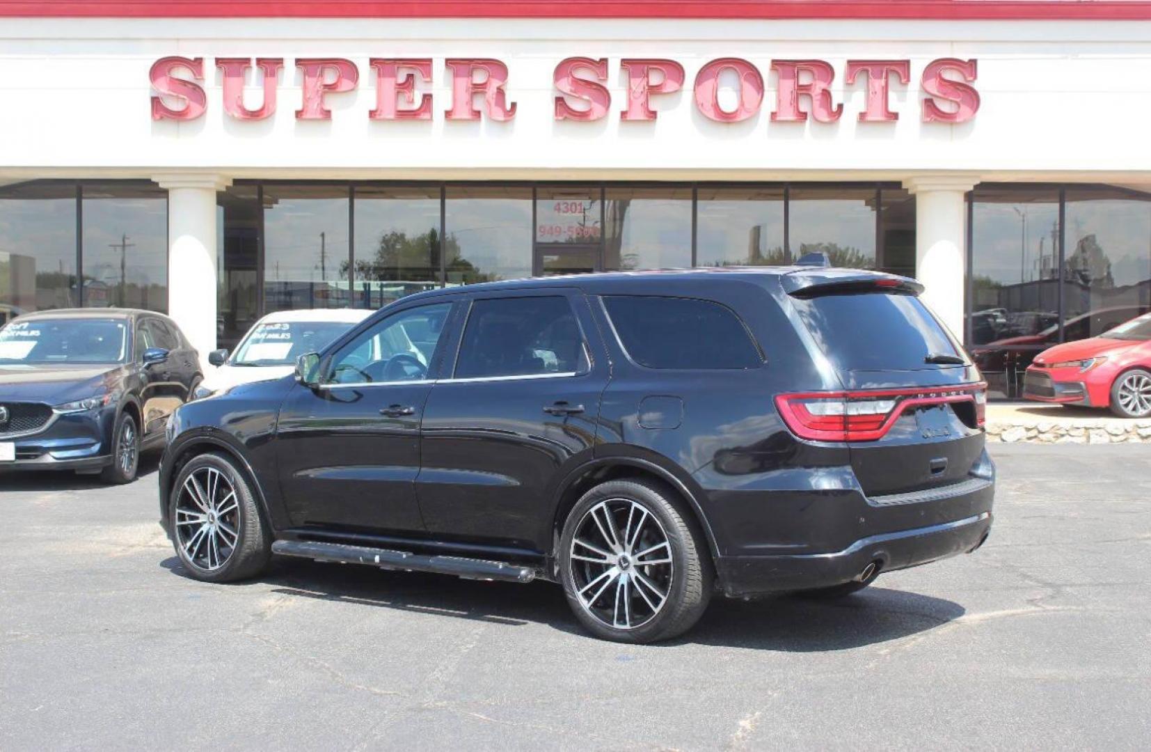 2014 Black Dodge Durango R/T AWD (1C4SDJCT1EC) with an 5.7L V8 OHV 16V engine, 8-Speed Automatic transmission, located at 4301 NW 39th , Oklahoma City, OK, 73112, (405) 949-5600, 35.512135, -97.598671 - NO DRIVERS LICENCE NO-FULL COVERAGE INSURANCE-NO CREDIT CHECK. COME ON OVER TO SUPERSPORTS AND TAKE A LOOK AND TEST DRIVE. PLEASE GIVE US A CALL AT (405) 949-5600. NO LICENSIA DE MANEJAR- NO SEGURO DE COBERTURA TOTAL- NO VERIFICACCION DE CREDITO. POR FAVOR VENGAN A SUPERSPORTS, ECHE UN - Photo#4