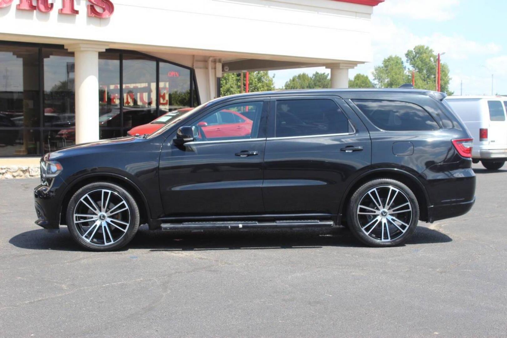 2014 Black Dodge Durango R/T AWD (1C4SDJCT1EC) with an 5.7L V8 OHV 16V engine, 8-Speed Automatic transmission, located at 4301 NW 39th , Oklahoma City, OK, 73112, (405) 949-5600, 35.512135, -97.598671 - NO DRIVERS LICENCE NO-FULL COVERAGE INSURANCE-NO CREDIT CHECK. COME ON OVER TO SUPERSPORTS AND TAKE A LOOK AND TEST DRIVE. PLEASE GIVE US A CALL AT (405) 949-5600. NO LICENSIA DE MANEJAR- NO SEGURO DE COBERTURA TOTAL- NO VERIFICACCION DE CREDITO. POR FAVOR VENGAN A SUPERSPORTS, ECHE UN - Photo#5