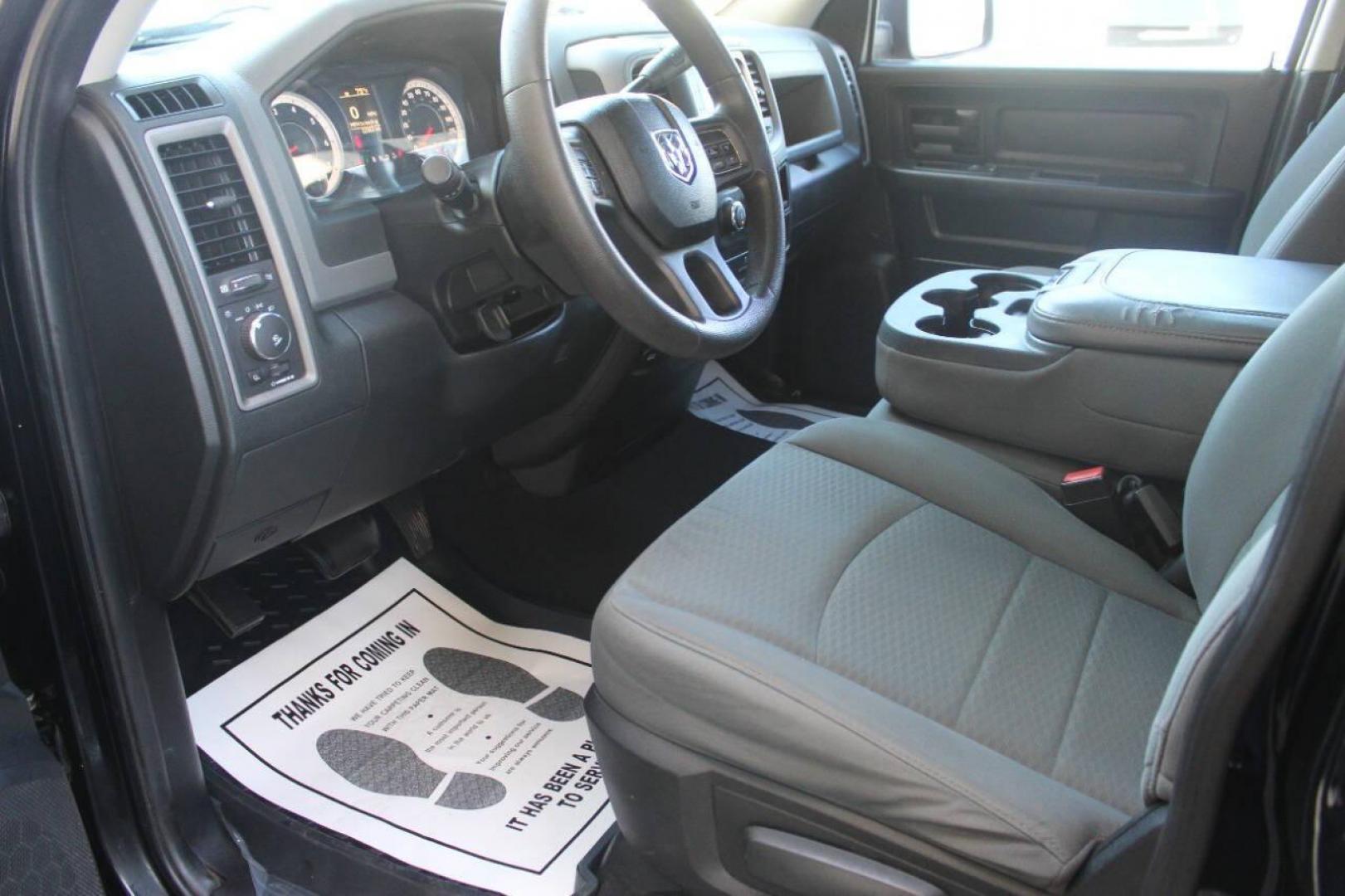 2014 Black RAM 1500 Tradesman Quad Cab 4WD (1C6RR7FT4ES) with an 5.7L V8 OHV 16V engine, 6-Speed Automatic transmission, located at 4301 NW 39th , Oklahoma City, OK, 73112, (405) 949-5600, 35.512135, -97.598671 - NO DRIVERS LICENCE NO-FULL COVERAGE INSURANCE-NO CREDIT CHECK. COME ON OVER TO SUPERSPORTS AND TAKE A LOOK AND TEST DRIVE. PLEASE GIVE US A CALL AT (405) 949-5600. NO LICENSIA DE MANEJAR- NO SEGURO DE COBERTURA TOTAL- NO VERIFICACCION DE CREDITO. POR FAVOR VENGAN A SUPERSPORTS, ECHE UN - Photo#15