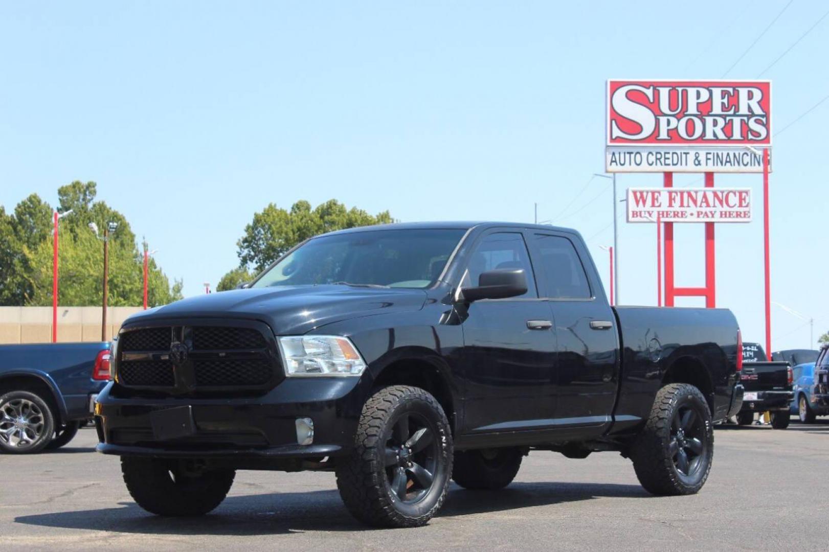 2014 Black RAM 1500 Tradesman Quad Cab 4WD (1C6RR7FT4ES) with an 5.7L V8 OHV 16V engine, 6-Speed Automatic transmission, located at 4301 NW 39th , Oklahoma City, OK, 73112, (405) 949-5600, 35.512135, -97.598671 - NO DRIVERS LICENCE NO-FULL COVERAGE INSURANCE-NO CREDIT CHECK. COME ON OVER TO SUPERSPORTS AND TAKE A LOOK AND TEST DRIVE. PLEASE GIVE US A CALL AT (405) 949-5600. NO LICENSIA DE MANEJAR- NO SEGURO DE COBERTURA TOTAL- NO VERIFICACCION DE CREDITO. POR FAVOR VENGAN A SUPERSPORTS, ECHE UN - Photo#6