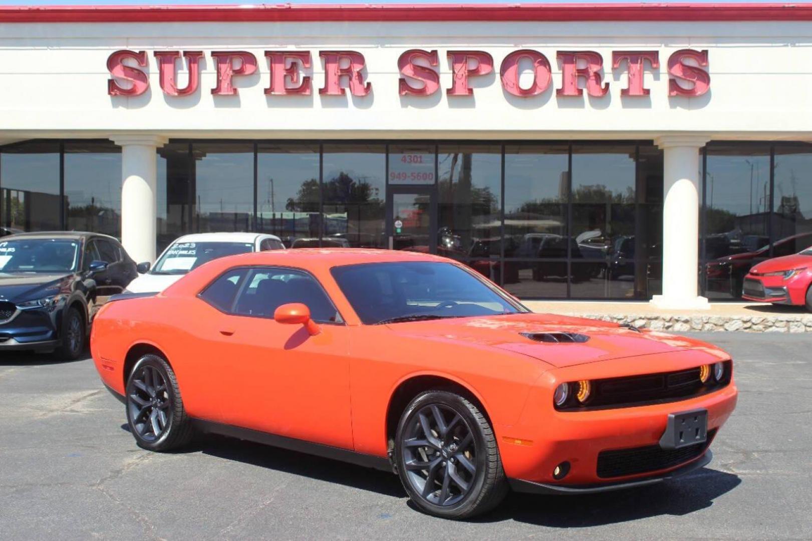 2021 Orange Dodge Challenger SXT (2C3CDZAG1MH) with an 3.6L V6 DOHC 24V engine, 8A transmission, located at 4301 NW 39th , Oklahoma City, OK, 73112, (405) 949-5600, 35.512135, -97.598671 - MUST SEE. NO DRIVERS LICENCE NO-FULL COVERAGE INSURANCE-NO CREDIT CHECK. COME ON OVER TO SUPERSPORTS AND TAKE A LOOK AND TEST DRIVE. PLEASE GIVE US A CALL AT (405) 949-5600. NO LICENSIA DE MANEJAR- NO SEGURO DE COBERTURA TOTAL- NO VERIFICACCION DE CREDITO. POR FAVOR VENGAN A SUPERS - Photo#0