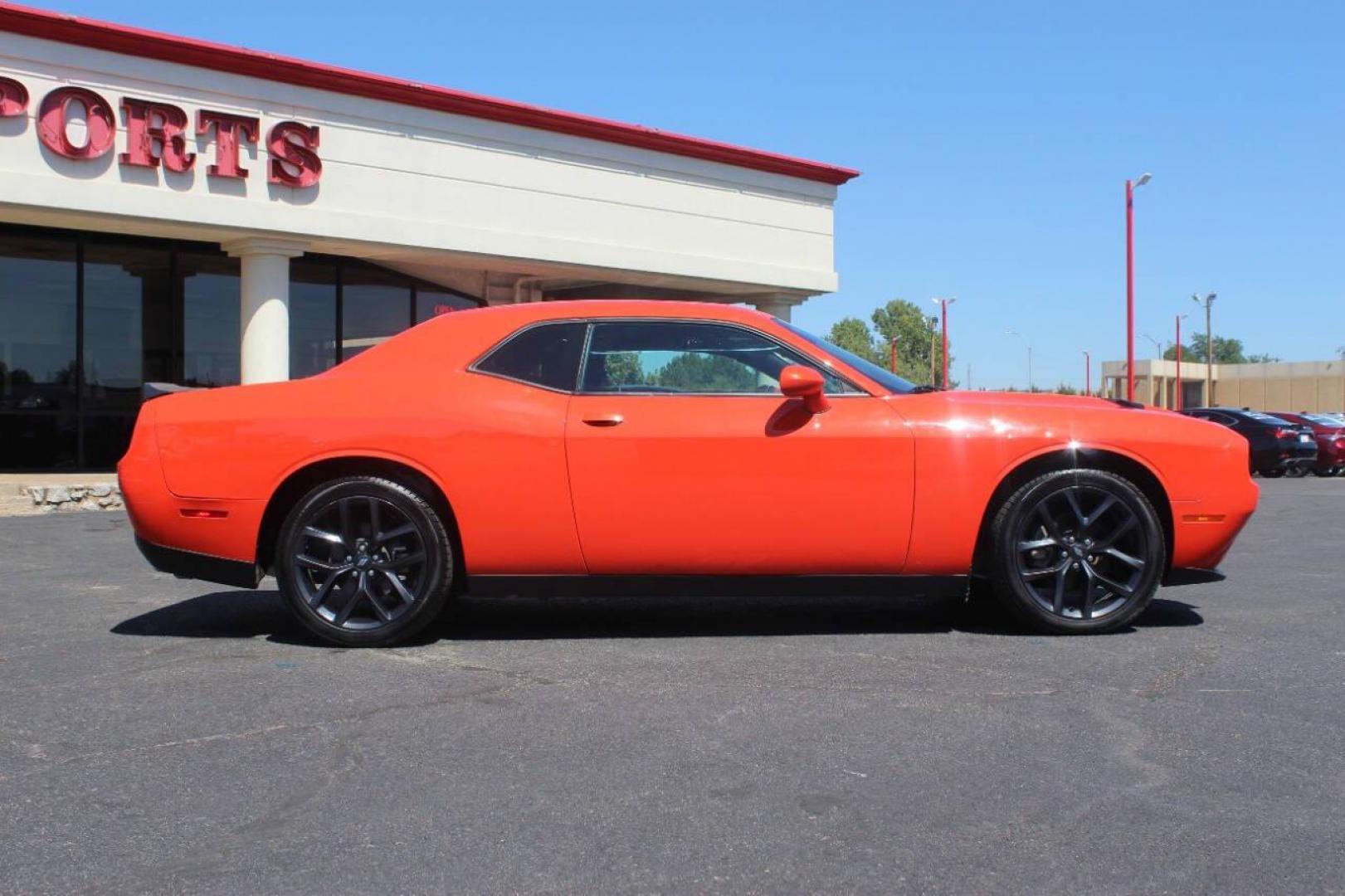 2021 Orange Dodge Challenger SXT (2C3CDZAG1MH) with an 3.6L V6 DOHC 24V engine, 8A transmission, located at 4301 NW 39th , Oklahoma City, OK, 73112, (405) 949-5600, 35.512135, -97.598671 - MUST SEE. NO DRIVERS LICENCE NO-FULL COVERAGE INSURANCE-NO CREDIT CHECK. COME ON OVER TO SUPERSPORTS AND TAKE A LOOK AND TEST DRIVE. PLEASE GIVE US A CALL AT (405) 949-5600. NO LICENSIA DE MANEJAR- NO SEGURO DE COBERTURA TOTAL- NO VERIFICACCION DE CREDITO. POR FAVOR VENGAN A SUPERS - Photo#2