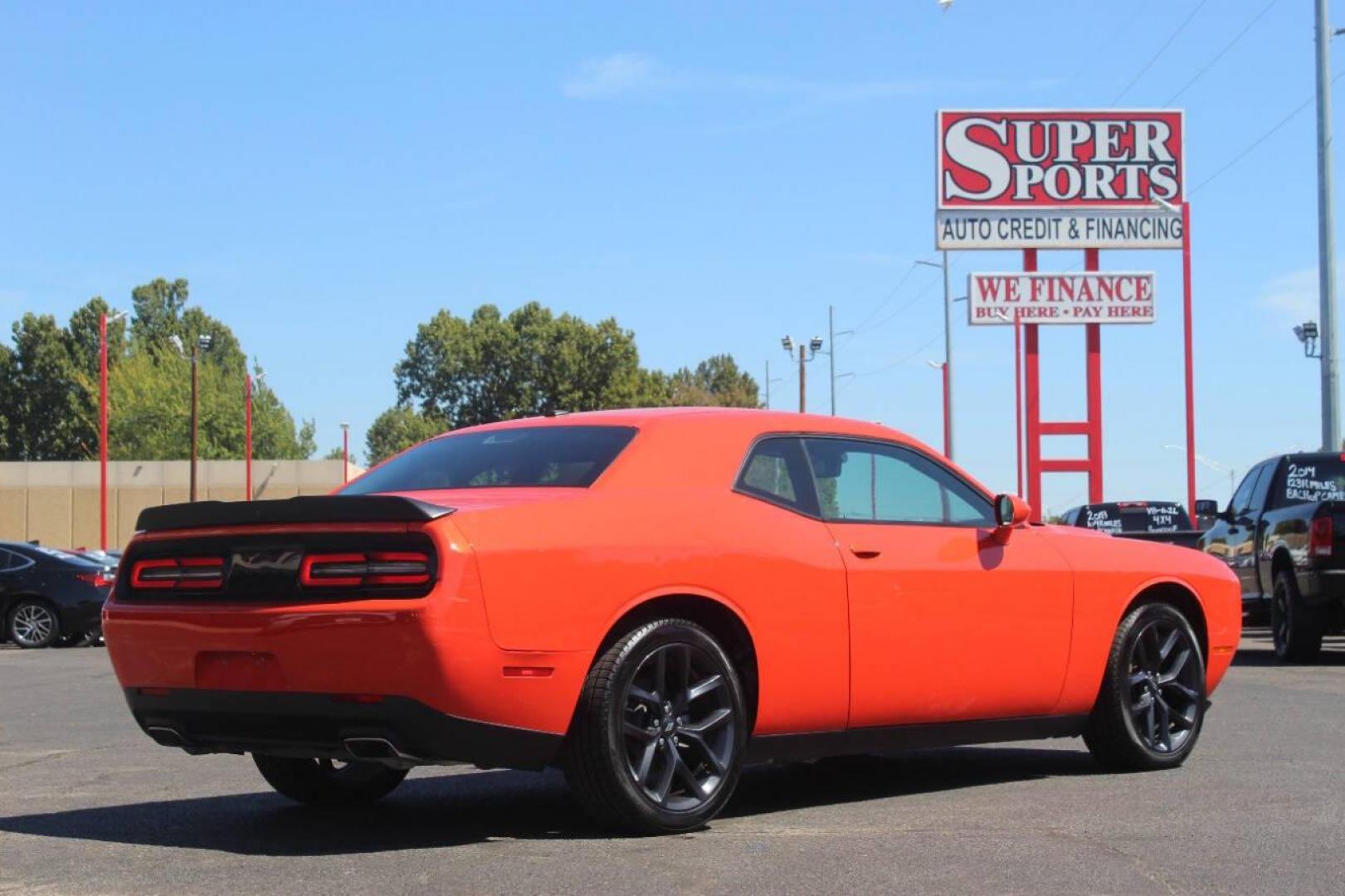 2021 Orange Dodge Challenger SXT (2C3CDZAG1MH) with an 3.6L V6 DOHC 24V engine, 8A transmission, located at 4301 NW 39th , Oklahoma City, OK, 73112, (405) 949-5600, 35.512135, -97.598671 - MUST SEE. NO DRIVERS LICENCE NO-FULL COVERAGE INSURANCE-NO CREDIT CHECK. COME ON OVER TO SUPERSPORTS AND TAKE A LOOK AND TEST DRIVE. PLEASE GIVE US A CALL AT (405) 949-5600. NO LICENSIA DE MANEJAR- NO SEGURO DE COBERTURA TOTAL- NO VERIFICACCION DE CREDITO. POR FAVOR VENGAN A SUPERS - Photo#3